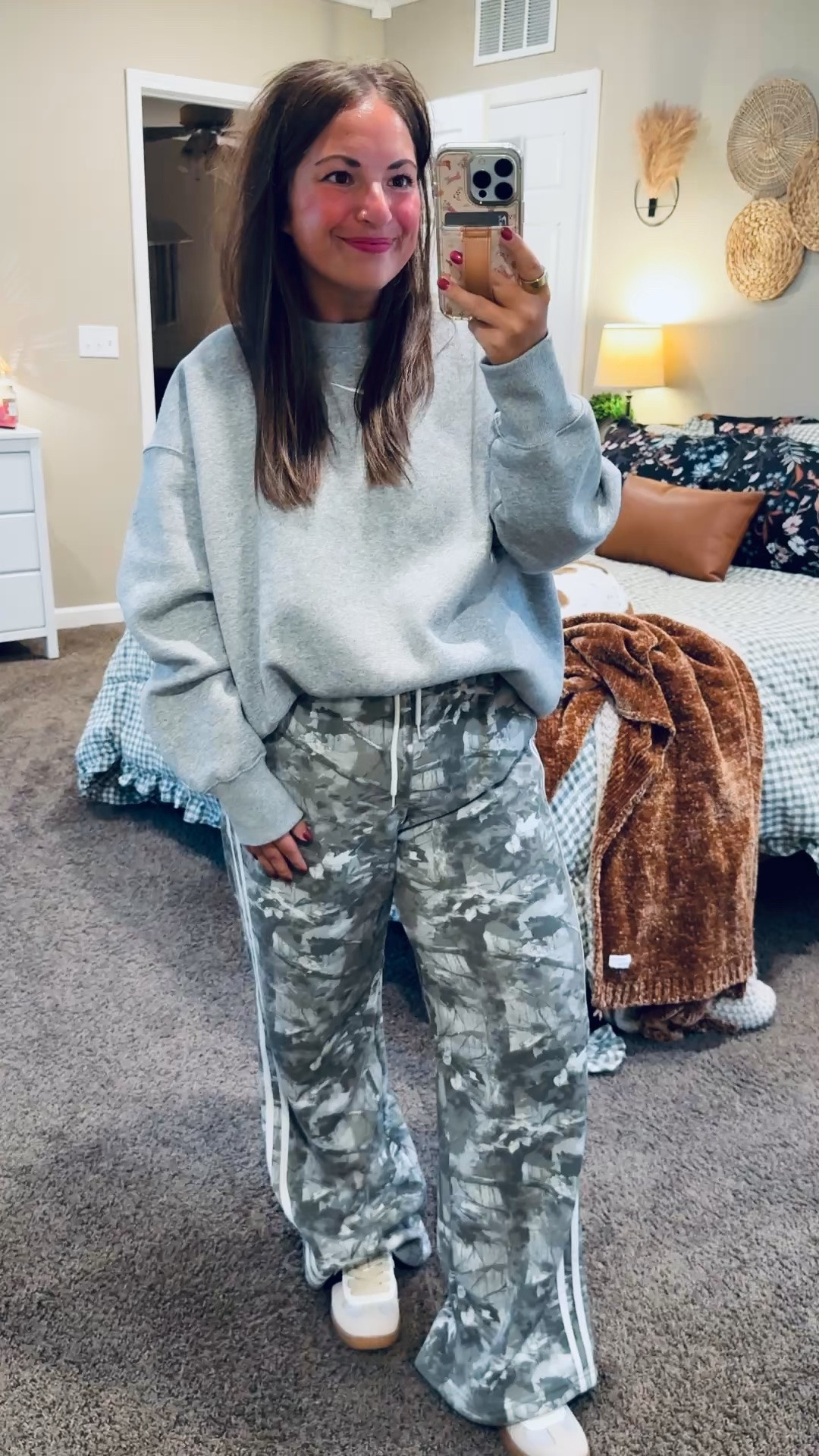 These camo printed wide-leg pants are such a fun find! I paired them with a cozy crewneck and sneakers for a comfy, casual look. 🤍

sneakers: fit true to size // wearing a 4
pants: fit oversized // wearing a medium
crew: fits way oversized // wearing a large 

 #LTKootd #LTKMidsize