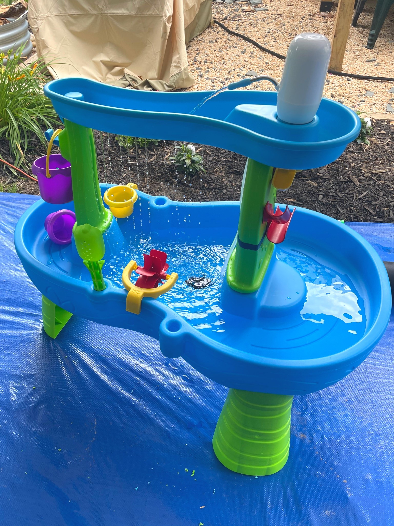 About to be a fun summer!!! The pump is an extra addition that is amazing to keep the fun going. You will need to drill a bigger hole on top and we drilled a hole on the side to re route the pipe into the middle of the water table. We used electrical tape to secure it (the black band). This way the pipe doesn’t interfere with the toys on the side. The pump is rechargeable and last for several hours of run time. Also adds a fountain sounding ambiance for the parents to enjoy :)  

#LTKFamily #LTKSummerEdit #LTKKids
