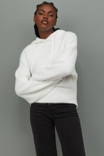 Fluffy sweater in a soft, fine knit. Large drawstring hood, heavily dropped shoulders, and long, ... | H&M (US + CA)