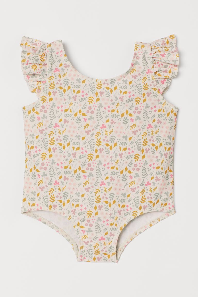 Swimsuit with a printed pattern, ruffle-trimmed shoulder straps, and a lined gusset. | H&M (US + CA)