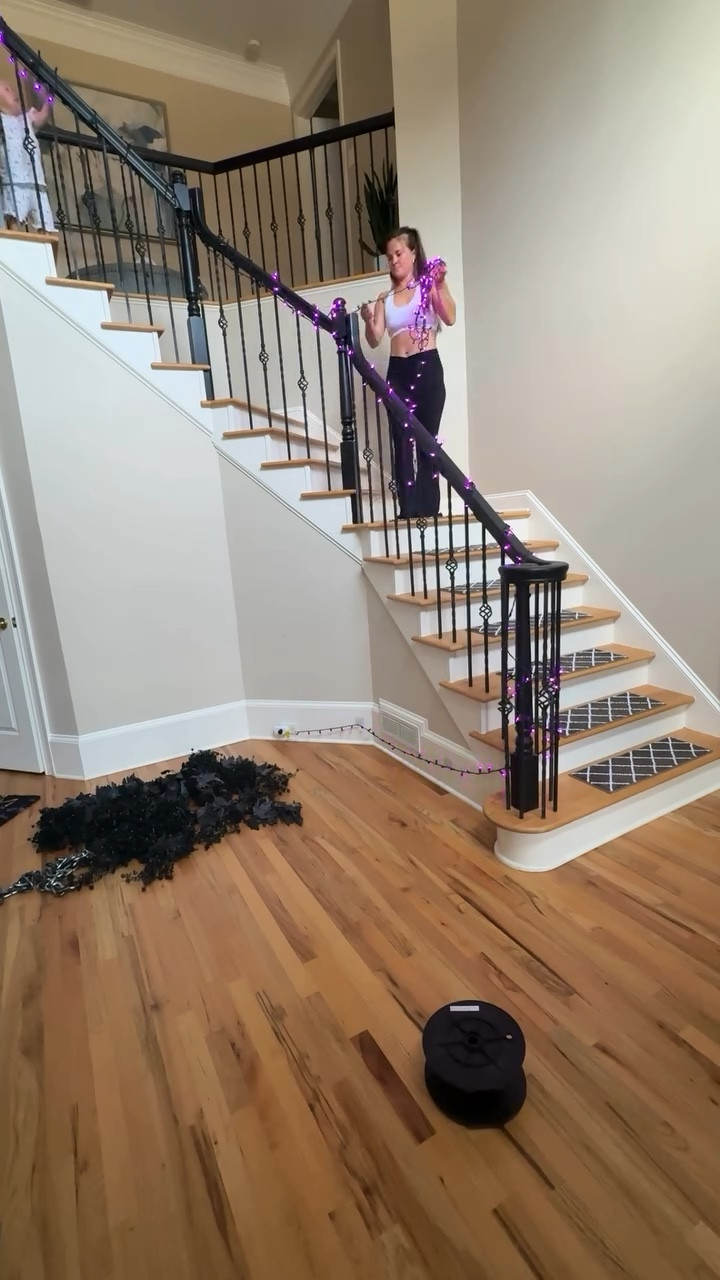 Me and mini me started in the foyer for Halloween decorating. Need to do the top banister next. 

#halloween #halloweendecor #halloweenentryway #foyer