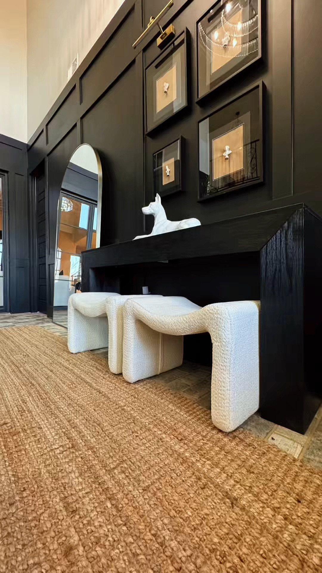 Our foyer transformation finally came together just in time for our in-home portraits.

The 74” console and oversized arch mirror from Wayfair were exactly what this space needed. I went through multiple consoles and mirrors before landing on these — the scale, the look, everything just worked. The console was also one of the easiest pieces I’ve assembled in a long time… sturdy, sleek, and timeless.

I layered in DIY shadowboxes, Amazon ottomans, and jute rugs (always — between us and our Doberman, they just make sense). The mirror is large and heavy, so getting it in was a moment… especially with freshly painted Tricorn Black walls 😅
DIY Shadow Box Decor inspired by @kiva_brent 

This space now feels finished, functional, and ready to live in — and it photographed beautifully for our family session.

I linked the exact pieces I used along with similar options, and yes… I even linked the gown (closest match available).

Everything is linked in my LTK.

#LTKHome