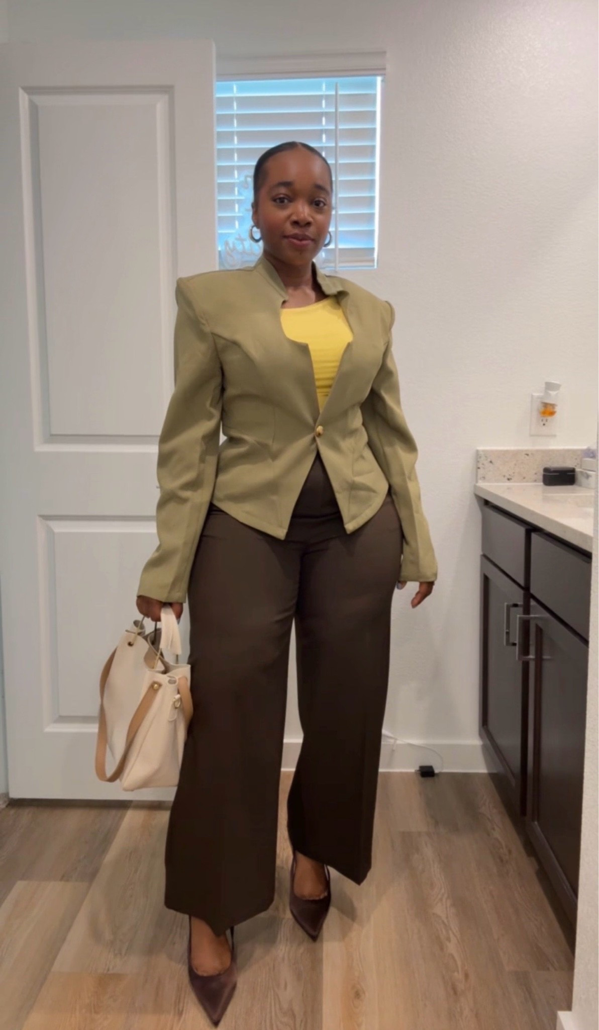 An elevated everyday outfit built piece by piece. 🤎

Classic trousers, a structured jacket, and timeless accessories = a look you'll reach for again and again.

Everything is linked for easy shopping. ✨

#LTKU #LTKMidsize #LTKWorkwear