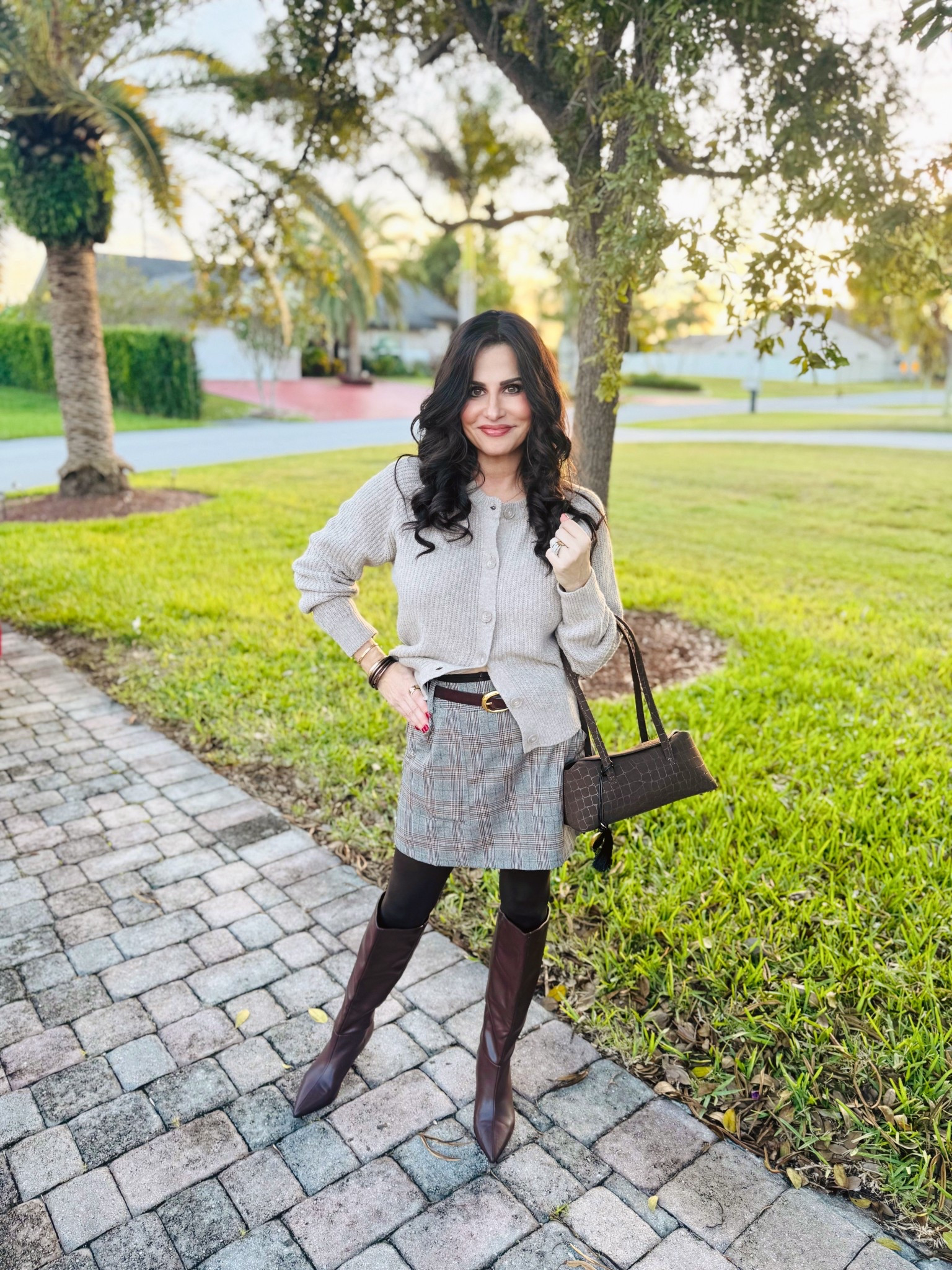 Plaid skirts are the cutest ever ! Perfect for the fall and winter months . Wearing a sm and I could of sized down by 1 . Cardi is old I will link similar .#plaidskort #fallstyle 

#LTKootd #LTKOver40 #LTKSaleAlert