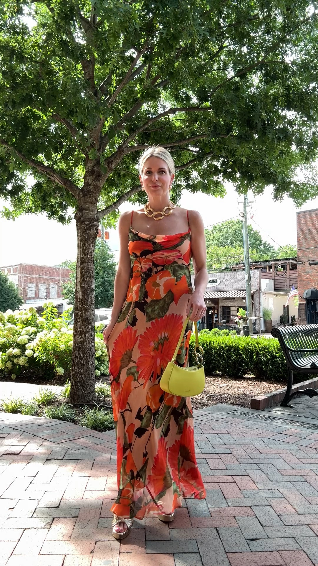 Bright color floral maxi dress and Staud bag for a night out 🧡

#LTKootd #LTKTravel #LTKWedding