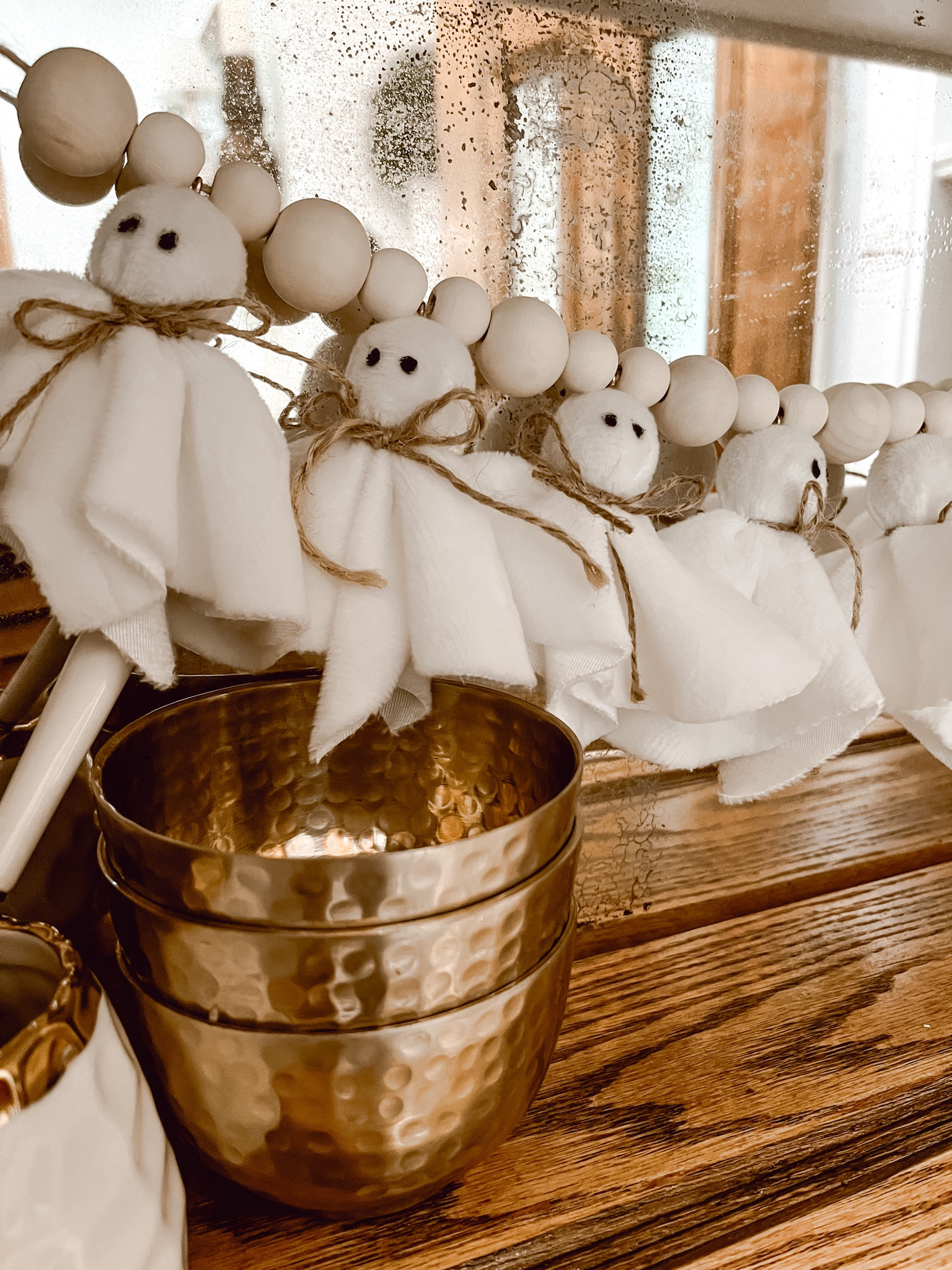 I absolutely love this ghost garland from Amazon. I strung it across the back of the coffee bar in my pantry. I also found some hammered copper bowls on Amazon that look so similar to my antiques one that they have me questioning whether mine are actually antique! 

#LTKHome #LTKFindsUnder50 #LTKSeasonal