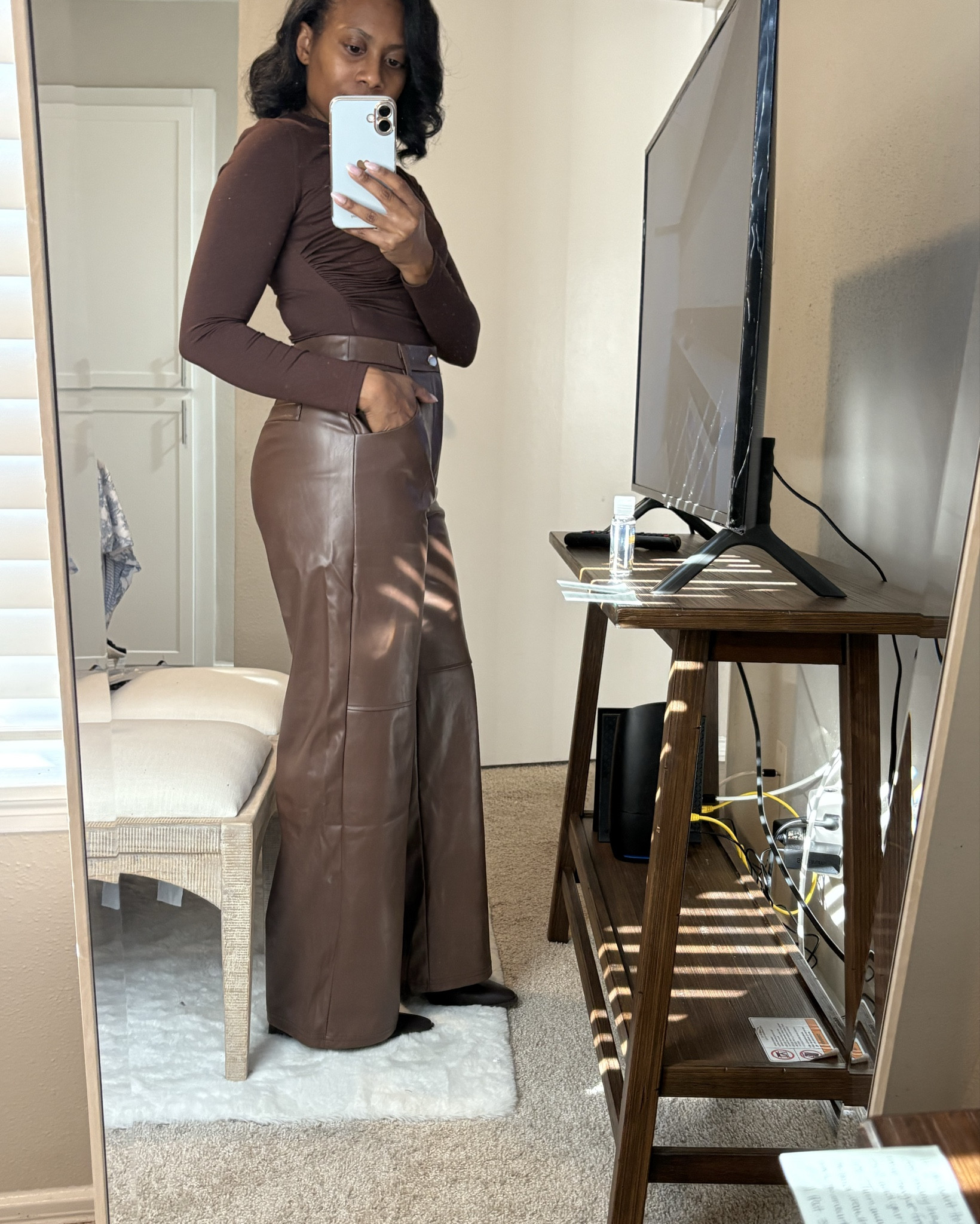 Ok yall! I told you about the chocolate lol! Are you here for it too?! 🤗🤎

These leather pants are the cutest. They are comfy and warm. Perfect to wear…any and everywhere! They are just the right height even though I’m 5’1.” Pair it with heels and I’m good to go.

They also have a little line in the middle…if you can tell. It gives it more of an edgy look and brings something different to the style. That’s one of the main reasons I got them. 😉

Top and pants from #shein 
Booties from #dsw#LTKHoliday 

#LTKFindsUnder50 #LTKSeasonal