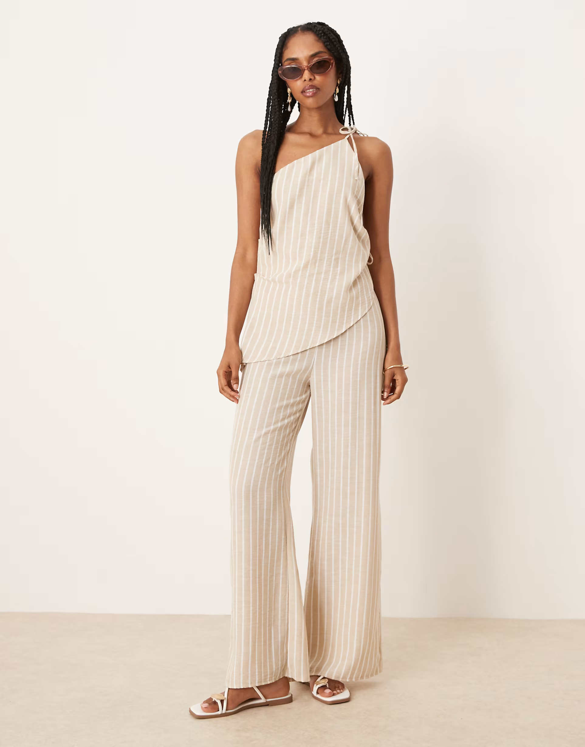 ASOS DESIGN linen jumpsuit with asymmetric ties in stone stripe | ASOS (Global)