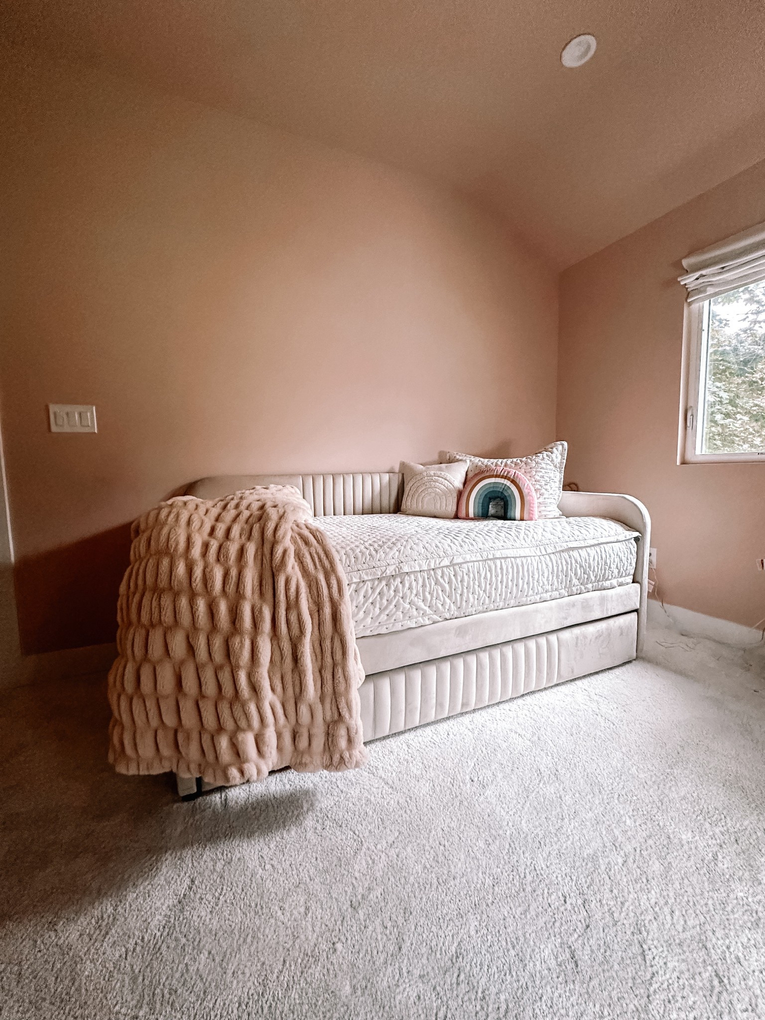 Cutest little girl’s bedroom. Peach walls and trundle day bed from Target  

#LTKSaleAlert #LTKHome #LTKKids