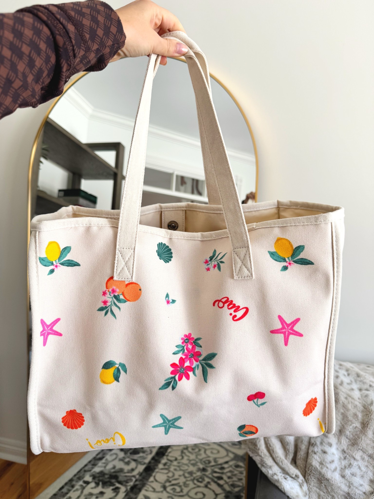 Had to grab this the second I saw the Italian details 🇮🇹

Such a good affordable summer tote—only $20 but looks so much nicer.

Perfect for travel or the beach since it folds flat but still holds a ton.

This is one of those easy pieces I know I’ll use all summer.

#LTKSeasonal #LTKSwim #LTKTravel