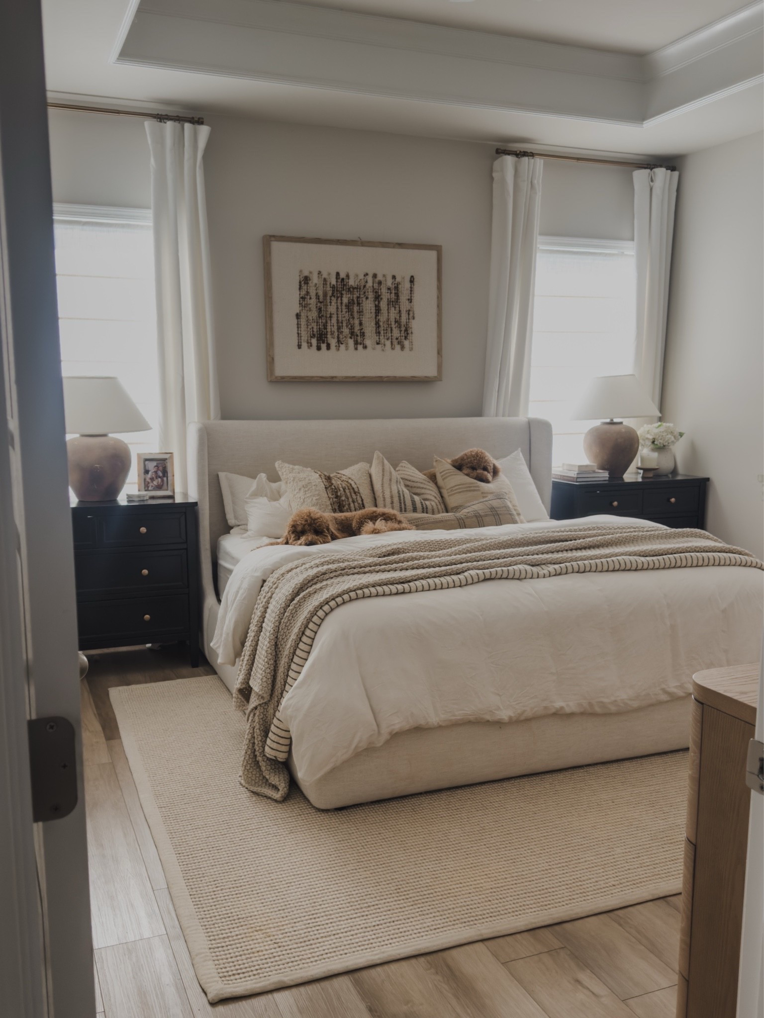 Light and airy primary bedroom styled with creamy linens, neutral brown tones, a mix of affordable and splurge furniture finds. 

My nightstands are giving all of the high end vibes for a budget price. They are actually baby dressers! All I did was swap the silver knobs to brass. 

Bedroom inspiration, Loloi, rugs USA, castlery, upholstered linen bed, textured throw pillows, Calabria lamp, faux hydrangeas, shop the look!

#LTKHome #LTKSaleAlert #LTKSeasonal