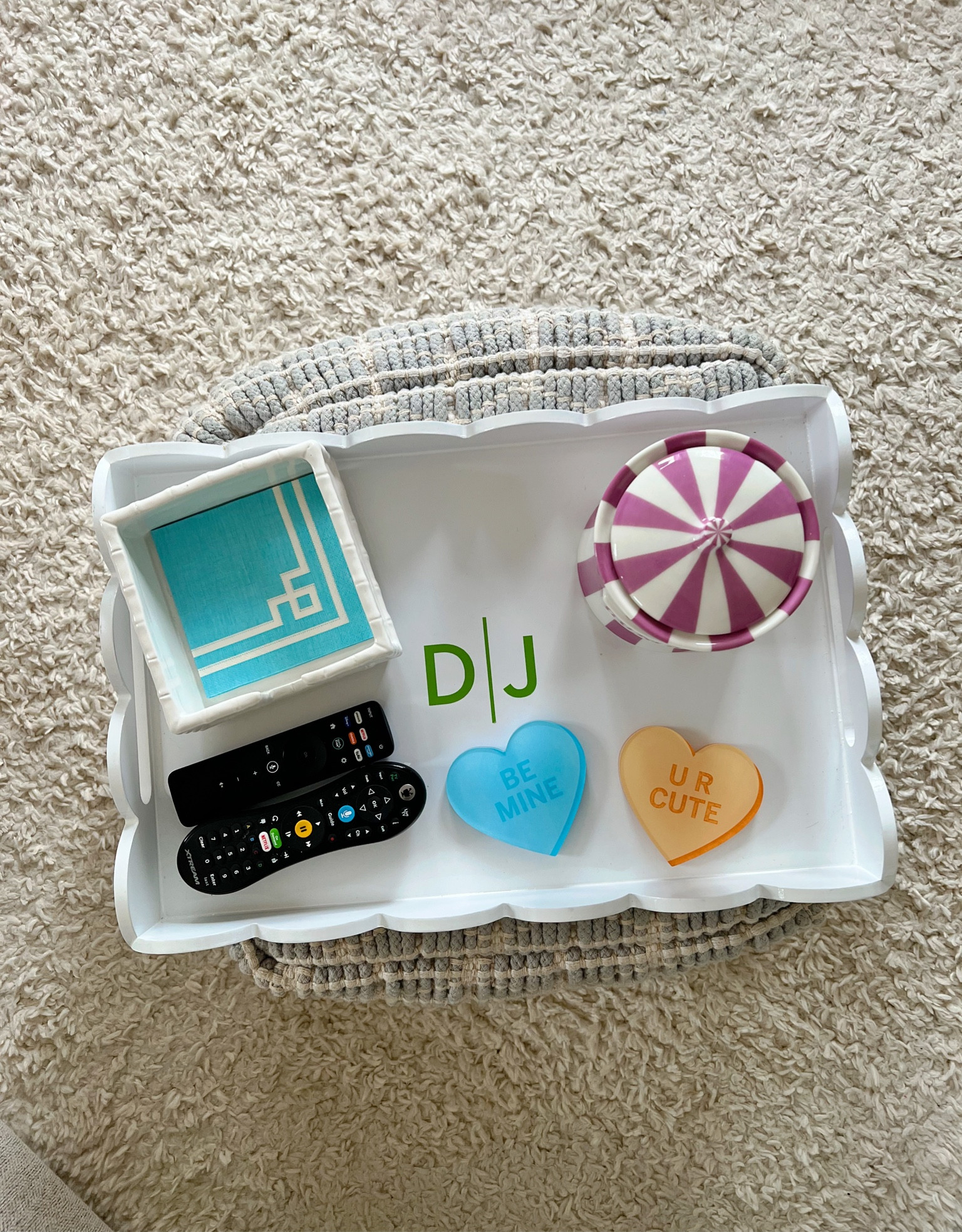 My small-space coffee table solution☺️ Our living area isn’t big enough to fit a coffee table in with the couch + TV, so I opted for this pouff ottoman and fun scalloped lacquer tray. It works so well given the circumstances! 

Styled with fun cocktail napkins, seasonal drink coasters, our TV remotes (lol) and this cheeky jar that I keep filled with candy to munch on while we watch! 

Love the selection at QVC right now and linking some things below that would look cute on our “coffee table”!

Apartment style. Preppy style. Colorful home.

#LTKunder100 #LTKhome #LTKstyletip