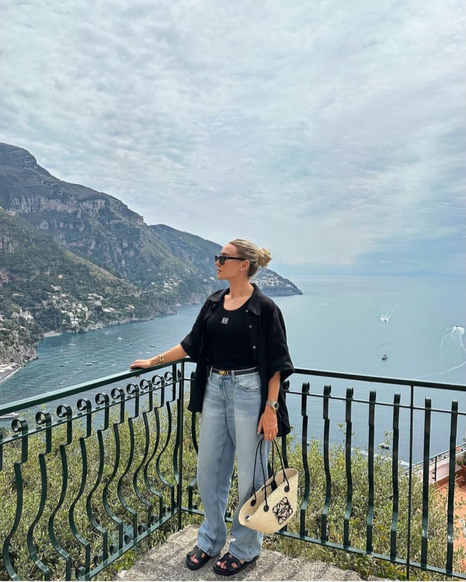 Positano summer holiday day outfit - wide leg blue jeans, black Loewe vest top, black linen shirt, Loewe black basket bag, Chanel sunnies & Hermès chypre sandals

#LTKstyletip #LTKSeasonal #LTKeurope