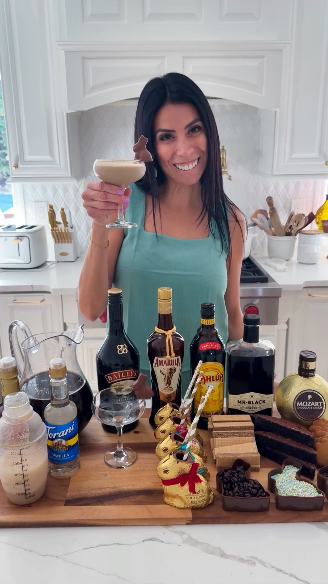 Make this Espresso BUNNY-tini bar! Here is the recipe for my batch espresso martini recipe:
* 2 cups of vodka 
* 2 cups of coffee liquor 
* 2 cups of strong cold brew 
* 1 cup of espresso (or instant espresso mixed in hot water)
* 1/2 cups simple syrup 
Add all ingredients to a pitcher or drink dispenser and mix well. You can definitely make this in advance and even put it in the fridge to have it chilled. I served this with some festive chocolate bunnies, I cut their ears and pour some drinks inside, or you can also make an incision on a mini chocolate bunny with a hot knife and have it as garnish on a glass. If people like a creamy espresso martini or a chocolaty one I added other liquors for everyone to add. Shake and serve! 


#LTKSeasonal #LTKHome #LTKfoodie