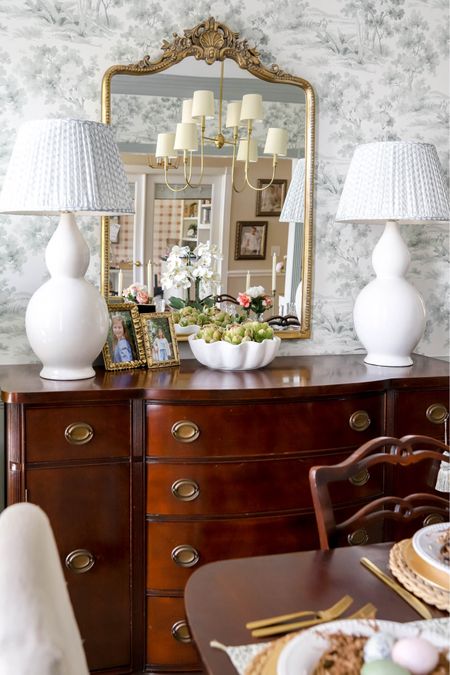 Two double gourd lamps and a scalloped bowl with artichokes decorate my dining room buffet.

#LTKhome