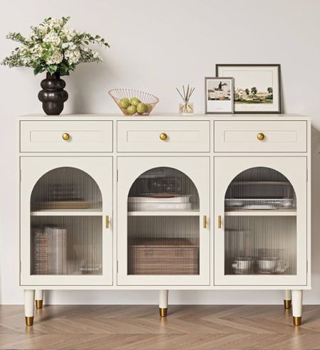 Sideboard, buffet, arched cabinets 

#LTKFamily #LTKStyleTip #LTKHome