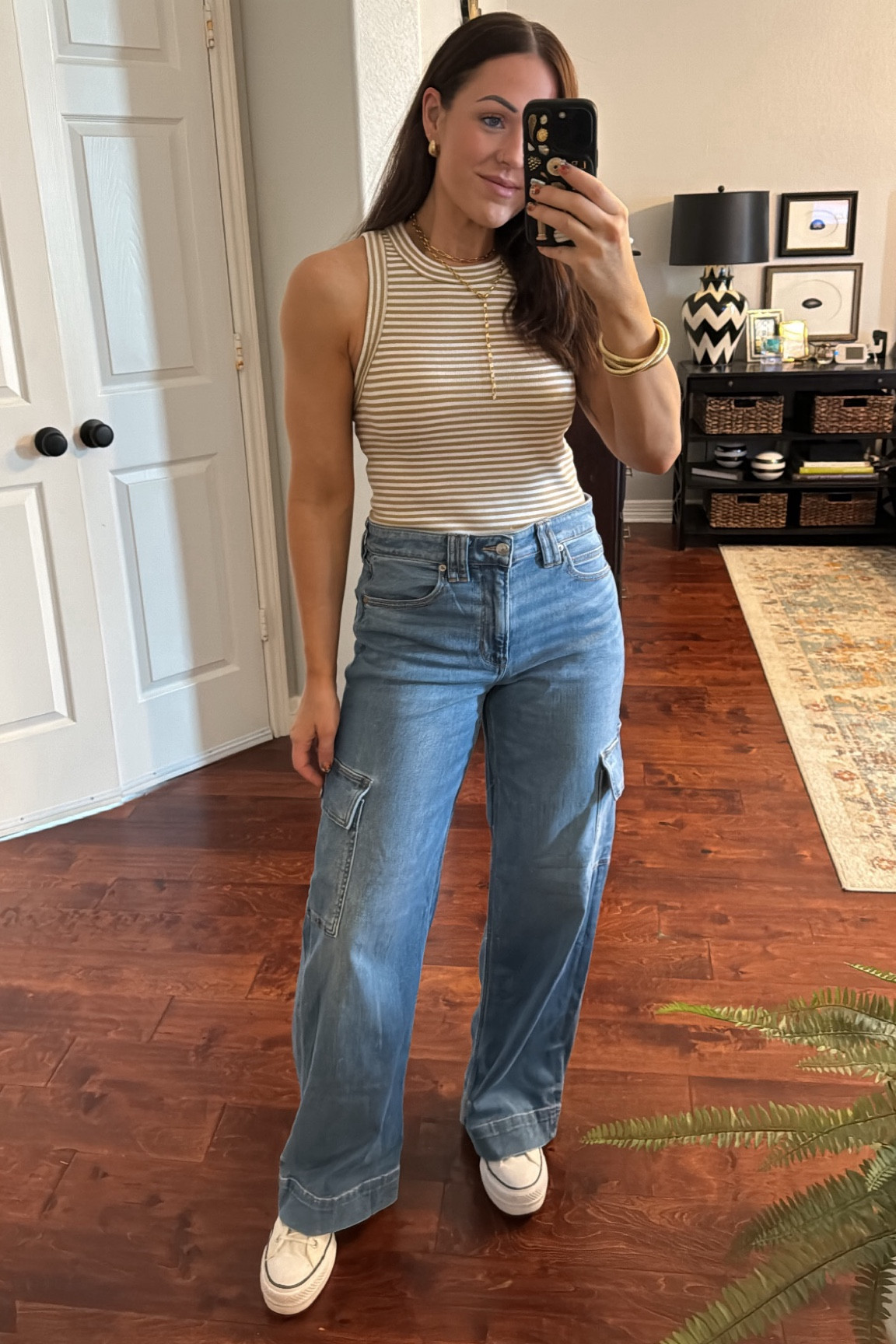 Travel outfit comfy American Eagle drapey dream baggy jeans converse high tops

#LTKstyletip #LTKfindsunder50 #LTKtravel