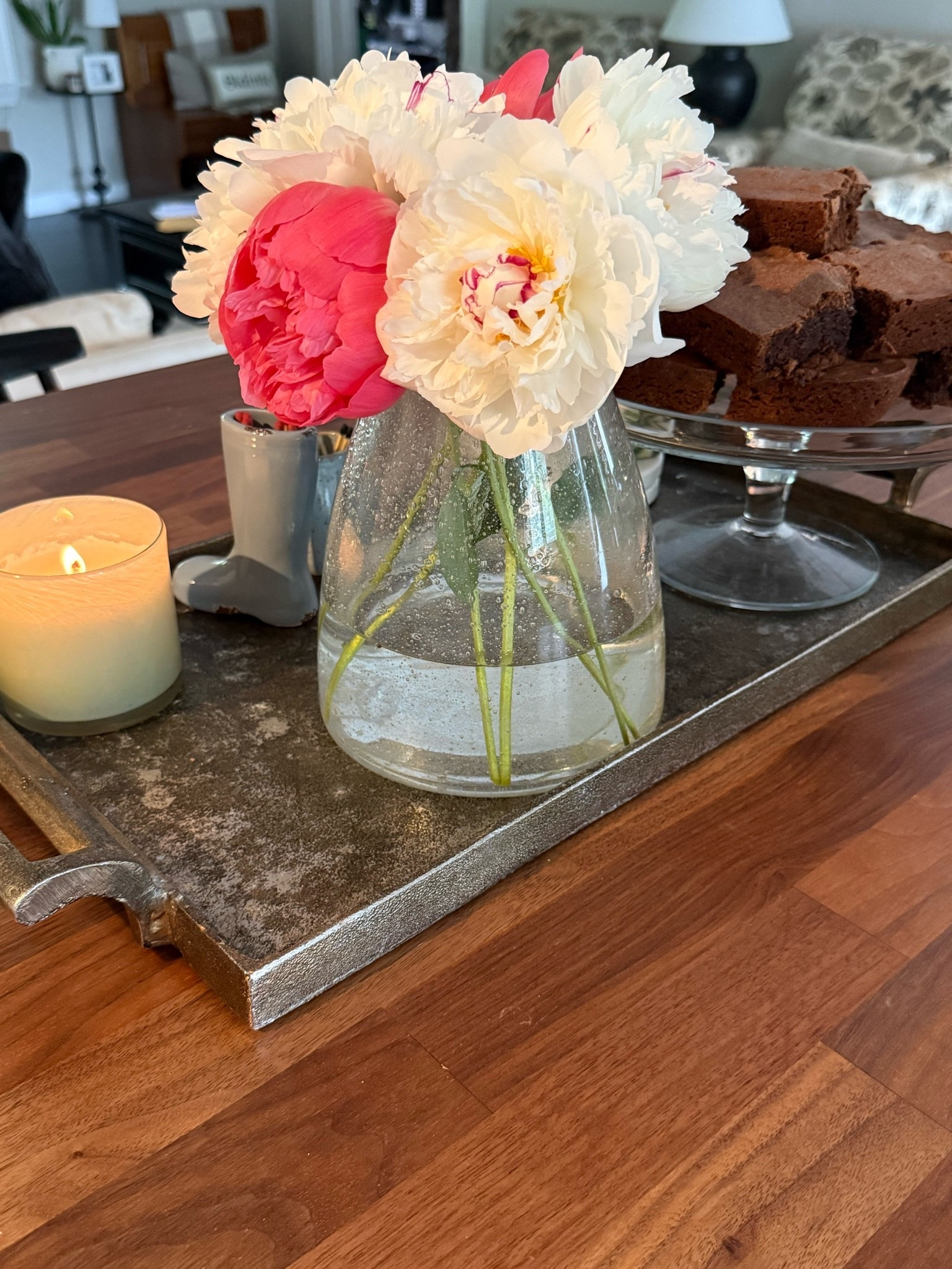 Dreary Thursday morning calls for a candle, peonies from the garden and fresh baked brownies.

Homemaking, baking, flowers, tray styling, home decor, home decorating

#LTKHome #LTKmorningroutine #LTKmomlife