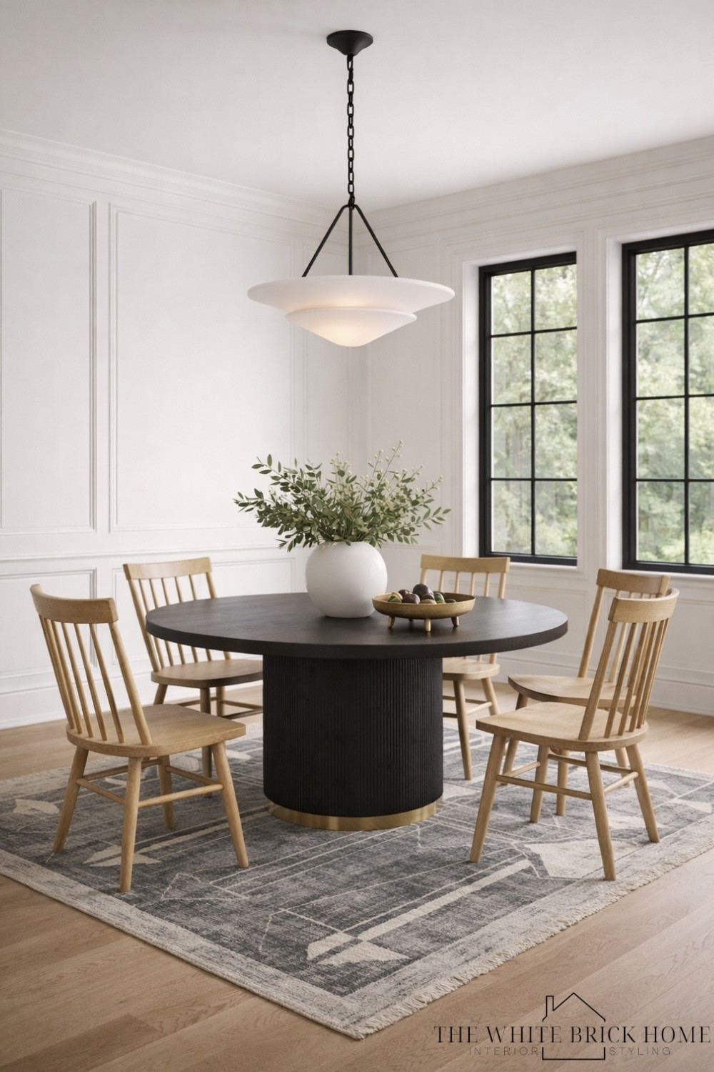 A refined dining space that blends classic silhouettes with black accents for a timeless dining area. 

Dining room, dining room decor, dining room ideas, dining furniture, dining chair, dining room table, dining room furniture, home decor, area rug, greenery, faux greenery, chandelier, lighting, light pendant, pottery barn, McGee and co 

#LTKSaleAlert #LTKSeasonal #LTKHome