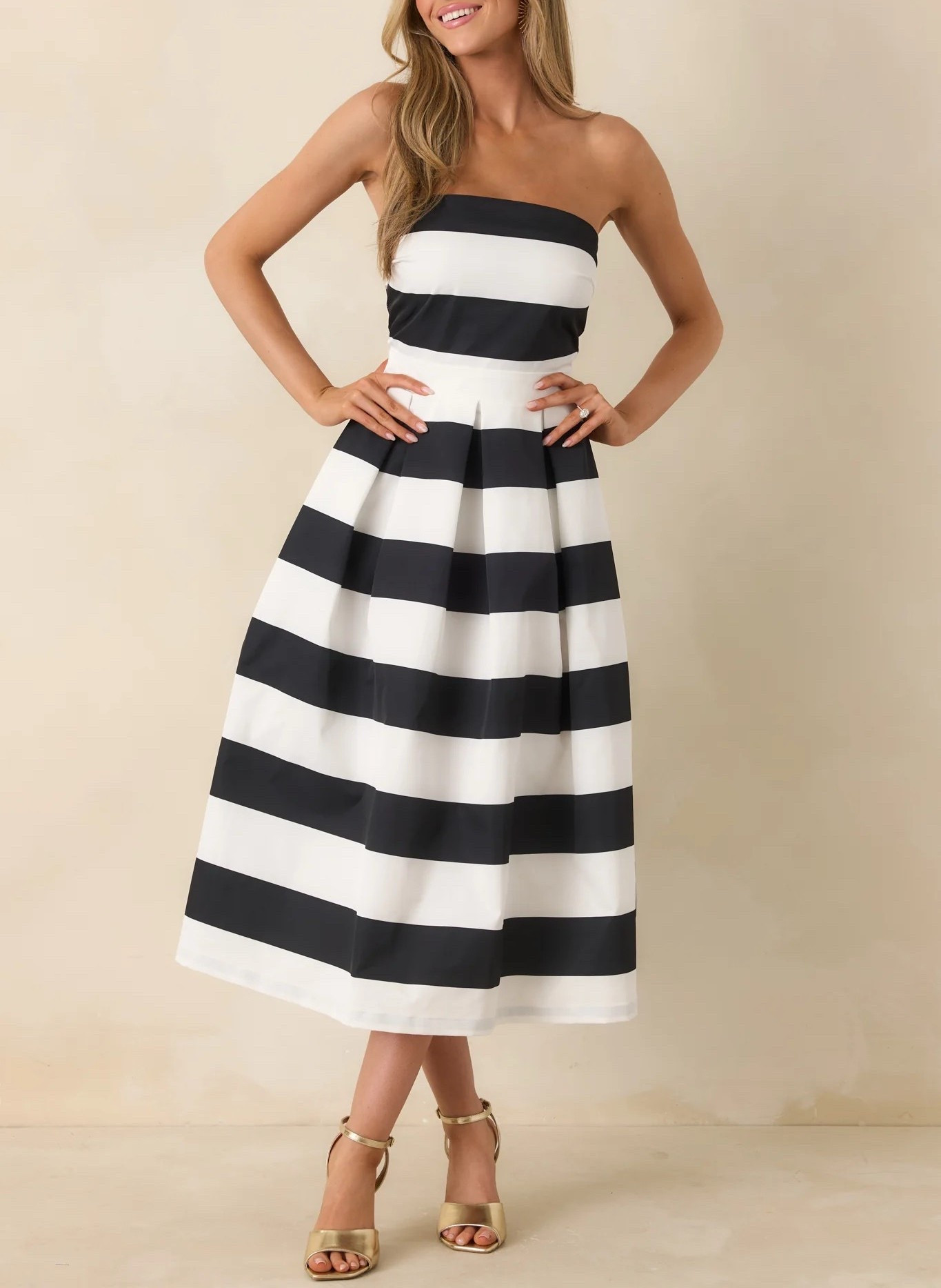Escape to the coast in a modern take on classic stripes. This strapless midi dress delivers understated impact with every wear. Under $70. Style the look with a cute handbag and heels.

Keywords: Coastal dress, spring outfits women, spring dresses women, blank and white striped dress, Fourth of July outfits, strapless midi dress, date night outfits, vacation outfits, resort wear 2026, vacation beach outfits, casual dresses women, summer vacation, summer outfits, summer dresses women, brunch outfits, floral midi dress, summer brunch outfit,     black and white stripe dress, strapless midi dress, striped midi dress, summer midi dress, fitted stripe dress, monochrome dress, resort outfits 2026, resort outfits women 

#LTKTravel #LTKootd #LTKgrwm