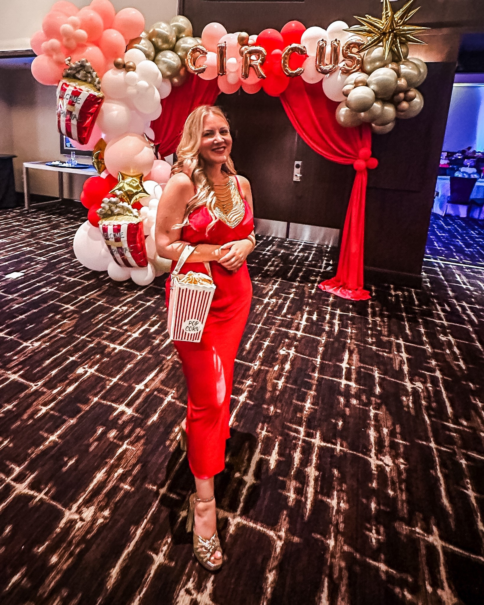 Circus theme outfit for circus theme party, or chic and glam twist on a circus Halloween costume. Especially if you’re doing a group costume! Can’t go wrong with a red satin dress, gold heels, and a popcorn purse. 

#LTKMidsize #LTKHalloween #LTKSeasonal