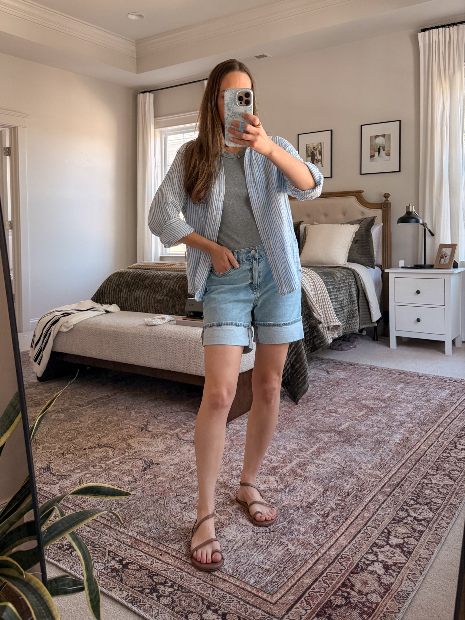 Travel day uniform ✈️ Comfy airport outfit that still looks put together for mom life: @onequinces gauze button-down (wrinkle-resistant = lifesaver in a carry-on), an easy tank, and denim mom shorts with the perfect length. Finished with TKEES sandals for security + walking to the gate.

Use my Quince code INFG-26LINENANDLIGHTCO10 💛

#LTKgrwm #LTKootd #LTKmomlife