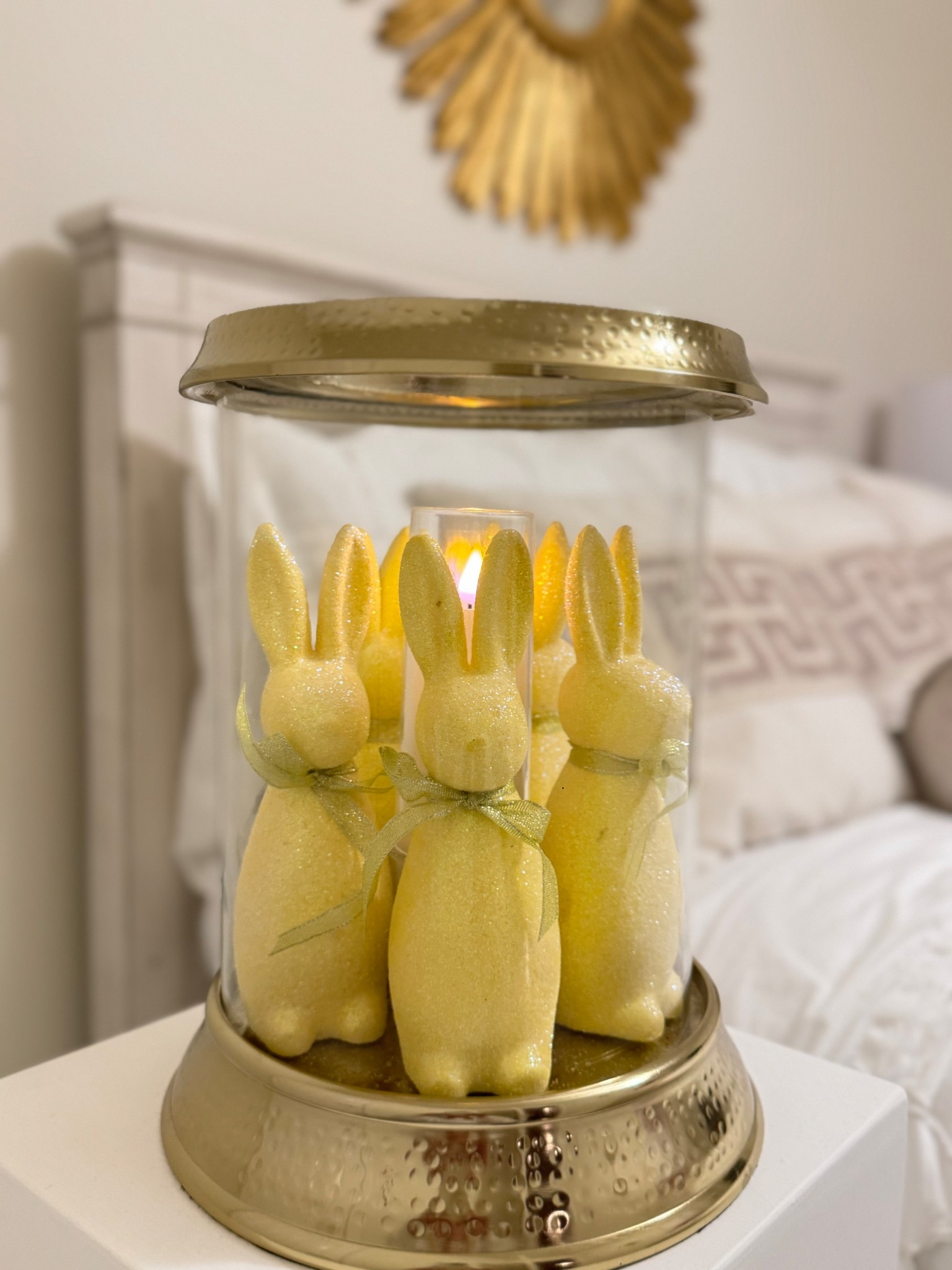 Found these adorable decorative bunnies at Michael’s and arranged them inside a hammered hurricane with a candle to create the cutest glowing nightlight! Perfect for adding a warm Easter touch to any space. ✨🐰
.
.
.
.
#EasterDecor #SpringVibes #DIYDecor #HomeAesthetic #BunnyLove #CozyGlow #FestiveTouch #CandlelightMagic #HandmadeDecor #MichaelsFinds #Easter #love 

#LTKHome #LTKStyleTip #LTKSeasonal