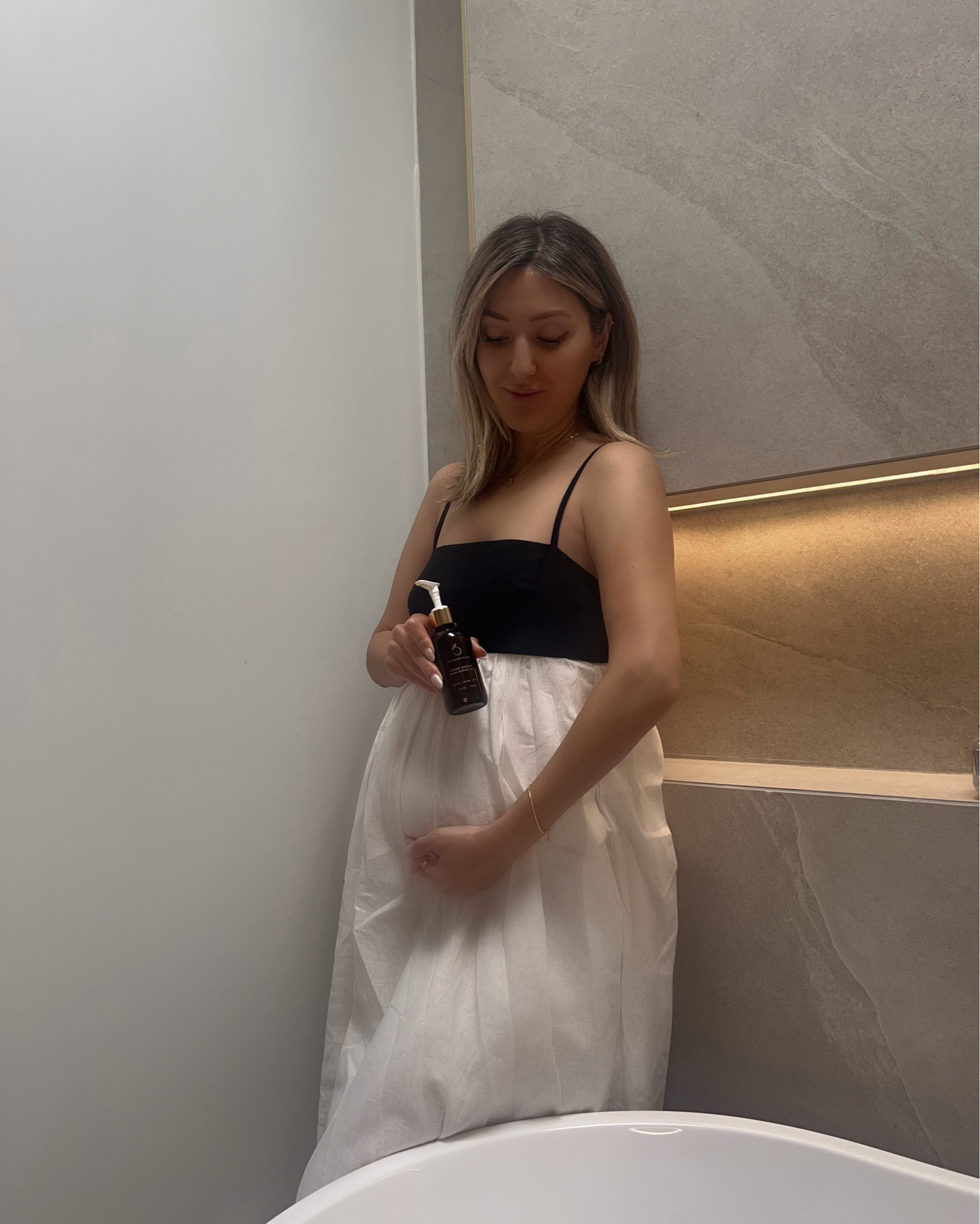 My holy grail while being pregnant! I’ve been use this @thegoldensecrets Womb Wisdom Skin-Toning Oil day and night on my belly and anywhere else that you might get stretch marks - it’s been helping with the itchy skin too! It’s fragrance-free and made with organic body oils so it’s pregnancy safe. Best self-care while I wait for baby girls arrival 😆 use code PRENY for 10% off 

Maternity 
Baby shower gift ideas 
Stretch mark pregnancy oil 
Clean pregnancy oil for stretch marks 
Self care 
Skincare 
Bump 



#LTKbaby #LTKfindsunder100 #LTKbump