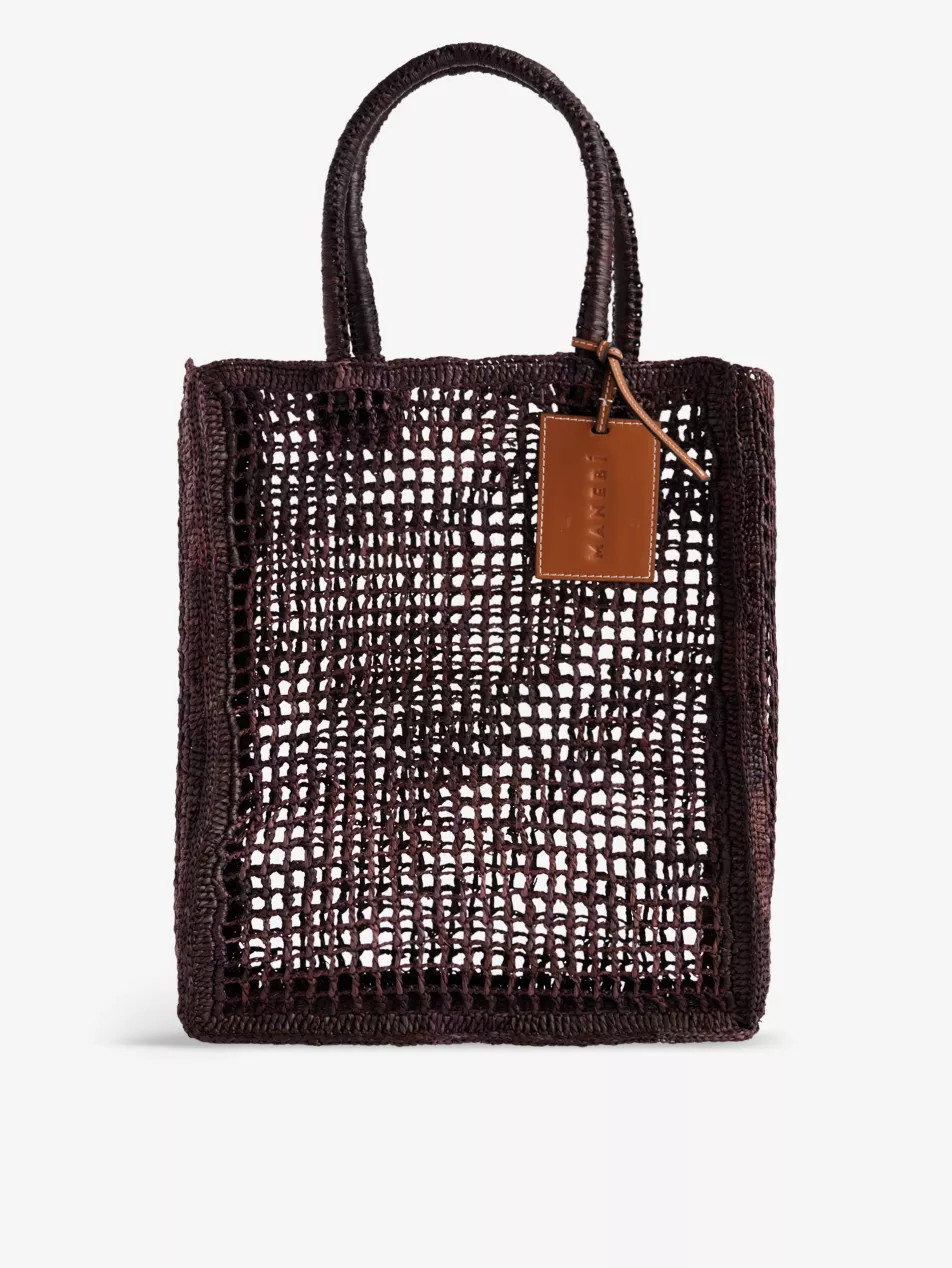 Net branded-charm raffia bag | Selfridges