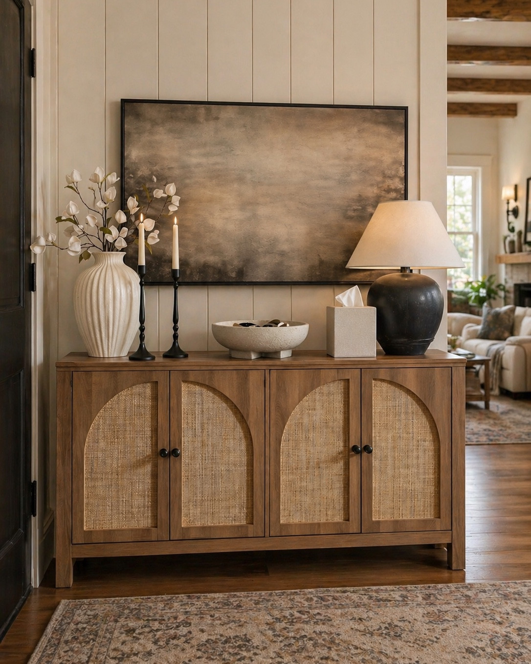 Neutral Amazon Console Table Styling That Looks Designer

Follow @farmtotablecreations on Instagram for more cozy, elevated finds 🤍

This is one of those looks that instantly makes a space feel finished. The warm wood tones paired with soft neutrals and simple styling pieces create that effortless, collected feel. A mix of height, texture, and clean lines—from the statement artwork to the sculptural lamp and woven cabinet—keeps it interesting while still feeling calm and cohesive.

#consoletable #homedecor #tablelamp #neutraldecor #livingroomdecor

#LTKHome #LTKSaleAlert