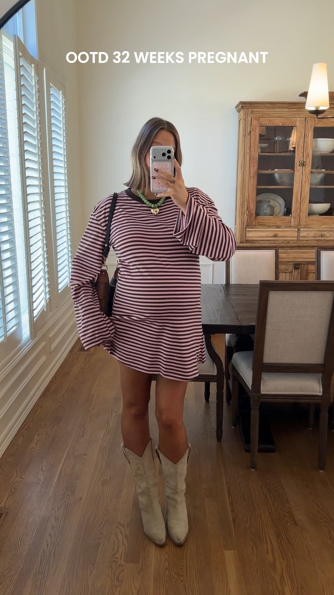 Dress size 10 I’m 5’ 5” and it’s such a perfect length!! If I wasn’t pregnant I would do an 8. Stick with true size. Boots true to size probably my most worn cowboy boots ever!! Amazon necklace for a pop of color 

#pregnancystyle #bumpstyle #stripeddress #bresheppard