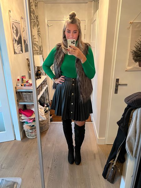 Outfits of the week

All dressed up and nowhere to go. 

Green turtleneck paired with a pleated faux leather skirt, over the knee OTK boots and a faux fur bodywarmer or vest. 

I wear the skirt in size 42 and I carry most of weight around my mid section  

#LTKstyletip #LTKSeasonal #LTKHoliday