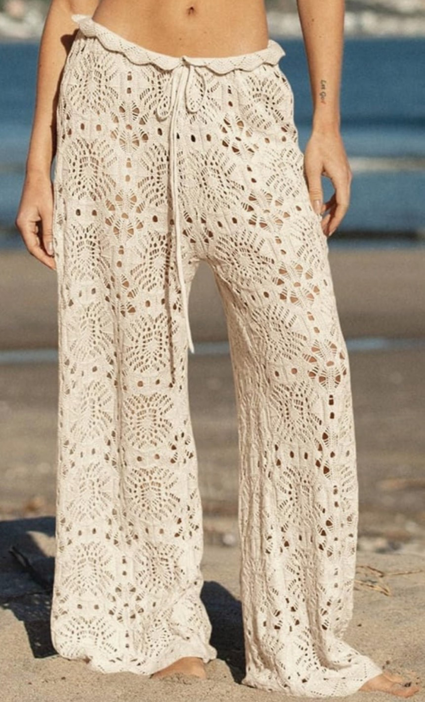 The sheer crochet beach pants that turn a simple swim look into a whole summer outfit. ☀️ High-waisted drawstring fit, wide-leg mesh knit, and that effortless throw-on style make them perfect for beach days, pool lounging, vacation outfits, festivals, concerts, or resort nights. 

Add to cart before your size sells out! ✨

#LTKSeasonal #LTKTravel #LTKSwim