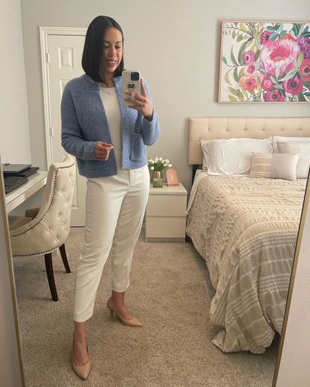For a chic spring outfit for work, I styled this blue boucle jacket with a white high neck bodysuit, and winter white ankle pants. 

#LTKstyletip #LTKworkwear #LTKSeasonal