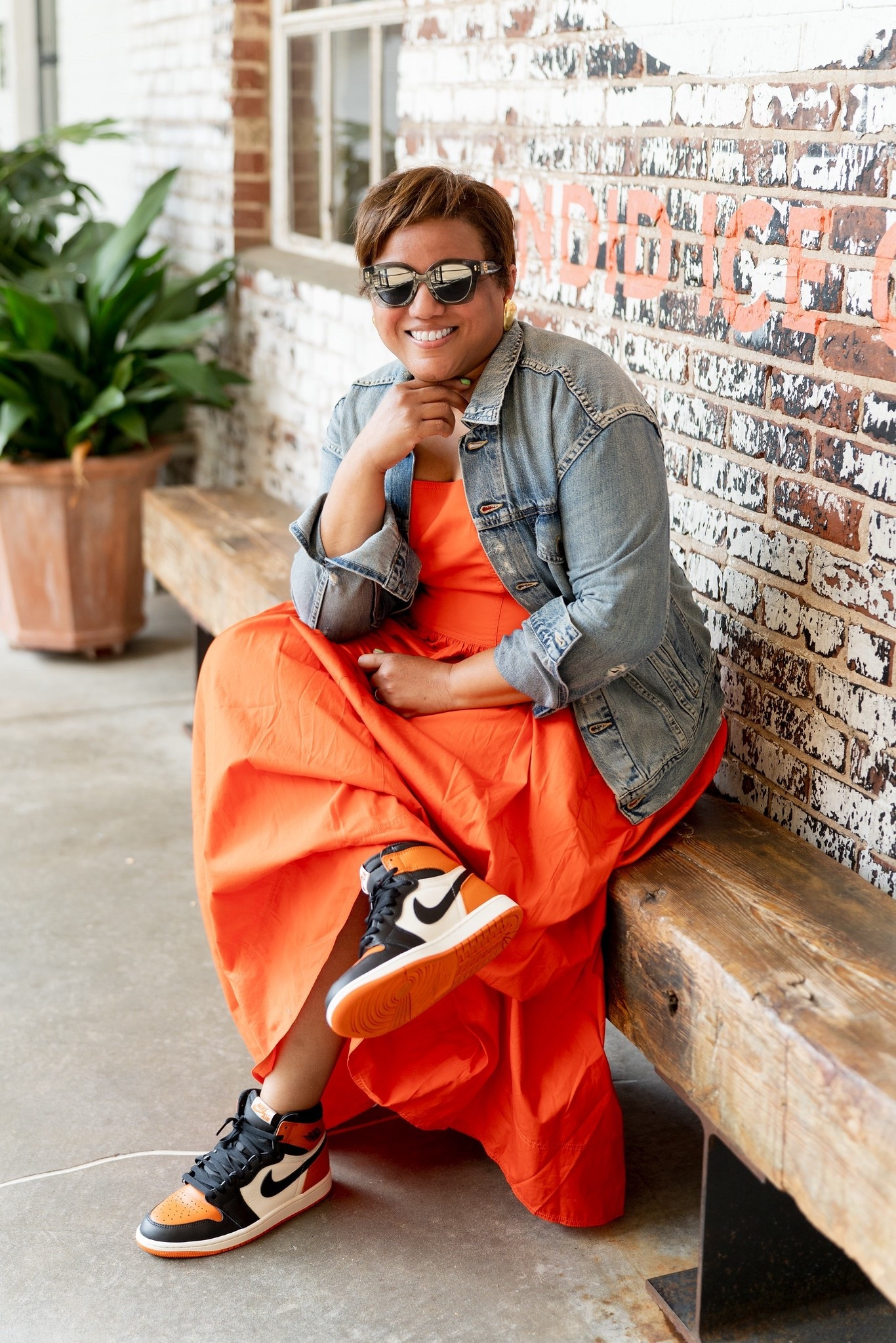 A denim jacket is my go-to layering piece!  And, I LOVE a distressed denim jacket!!!  Also, this dress is the perfect transitional piece as the seasons change!  The dress is offered in white, too, because over here we’re all about white after Labor Day! Fit is TTS for the denim jacket and for the dress. And, these sneakers are SOOO fab! 🧡👗