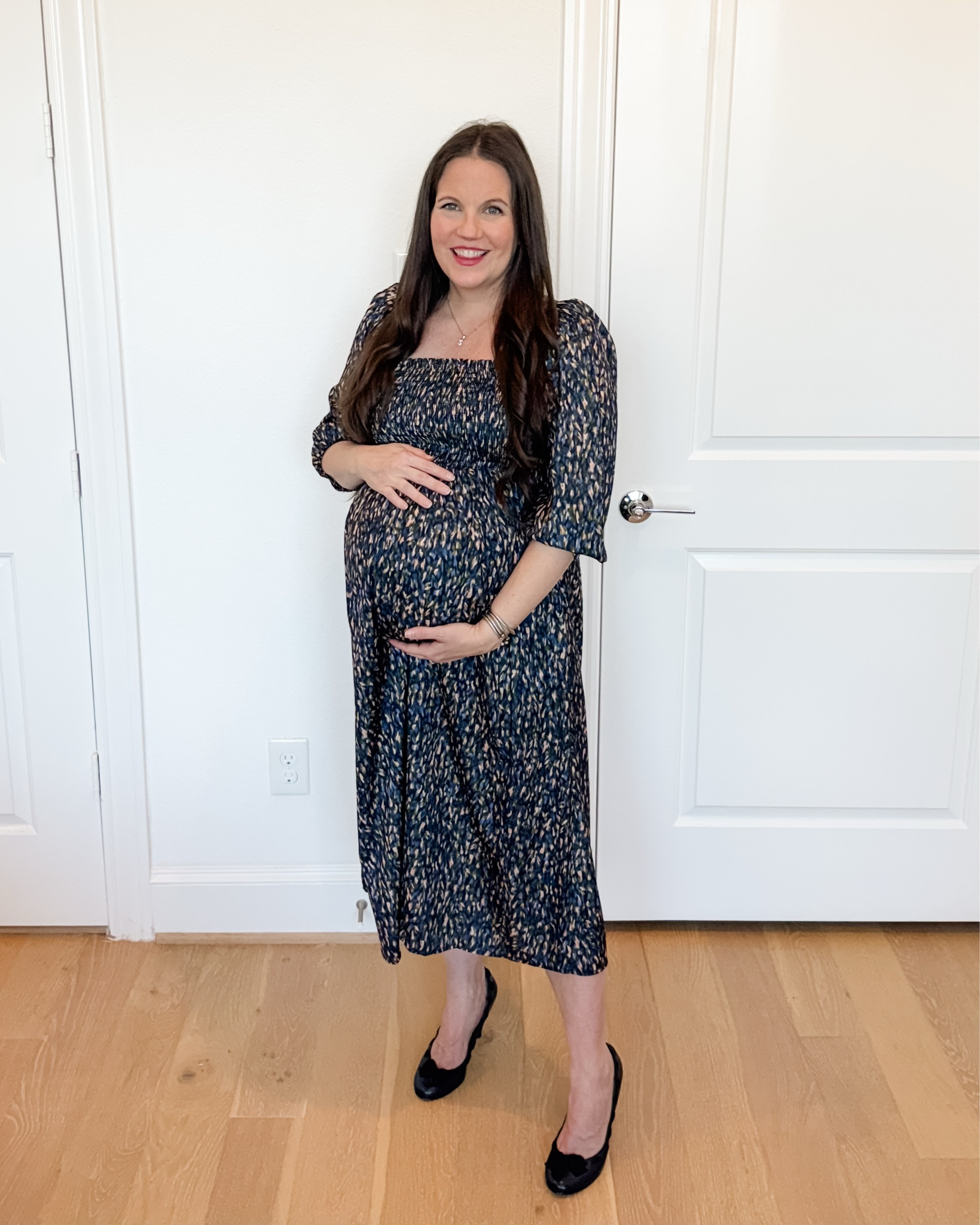 This silky sateen maternity dress with a smocked bodice is such a beautiful and practical piece for everyday style. It makes the perfect work outfit and polished work dress, with comfortable stretch and a flattering fit that works throughout pregnancy.

I love that this maternity dress with sleeves transitions easily into a fresh spring outfit, and it pairs perfectly with classic navy heels for a timeless look. It’s a great staple for workwear and one of my favorite options for chic pregnancy office outfits that feel both comfortable and put together.

Everything is linked below so you can recreate this polished maternity work look 

#LTKBump #LTKOver40 #LTKWorkwear