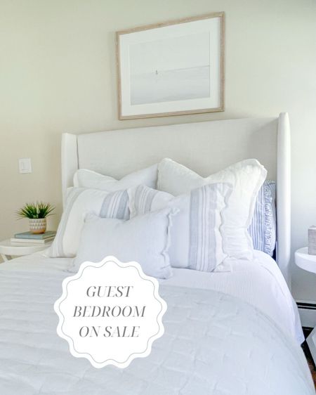 Quite a few pieces in my guest bedroom are currently on sale including the bed, blue linen quilt, striped pillowcases, and the artwork! You must use code LTKART24 to get 15% off the art, and it ships free! 

-
Coastal home decor, coastal style, neutral home, guest room decor, guest bedroom, coastal bedroom decor, coastal interiors, bedroom ideas, coastal decorating, beach home, beach house style, beach house decor, decorative throw pillow, bed pillow styling, planter pot, soft linen pillow covers, blue and white decor, linen quilt, blue bedding, white bedding, blue quilt, coastal bedding. serena & lily light blue quilt, neutral bed, white bed, Wayfair bed, upholstered bed, pottery barn look for less, Nantucket striped linen pillowcase, pillow styling, bedroom ideas, neutral bedroom, bedroom pillow styling, striped pillows, target pillows, blue and white pillows, affordable bed, pottery barn look for less, Tilly bed, water bed, beds on sale, affordable beds, Wayfair beds, upholstered beds, white beds, coastal beds, primary bedroom ideas, white bedding, blue & white bedding, coastal artwork, wall decor, beach art, blue & white decor  

#LTKsalealert #LTKfindsunder100 #LTKhome