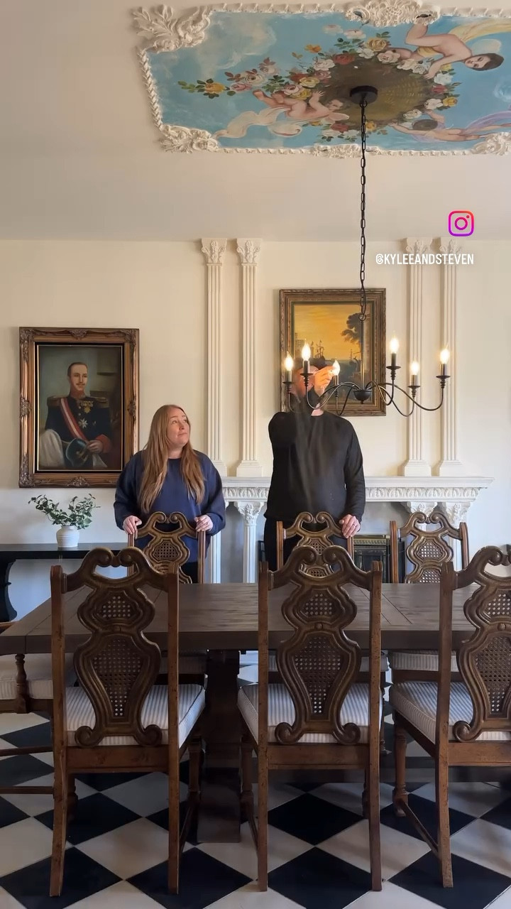 This one’s for everyone who was worried that we’d take away the character of the home 😉

We kept the original artwork and dining chairs but swapped out the tables/chandelier and ditched the rug/bulky curtains. 

Small changes, big impact!

The most challenging part was installing the new light - it’s hard to tell (even in person!) but the painted ceiling is actually canvas with decorative moulding around the edges. 

There was a hole cut in the center for the old light wiring but Steven had to be extremely careful when installing the new one so that he wouldn’t damage it. 

#shorttermrental #airbnbsetup #castlerenovation #diyhome #beforeandafter #fixerupper 

#LTKHome #LTKCyberWeek #LTKWatchNow