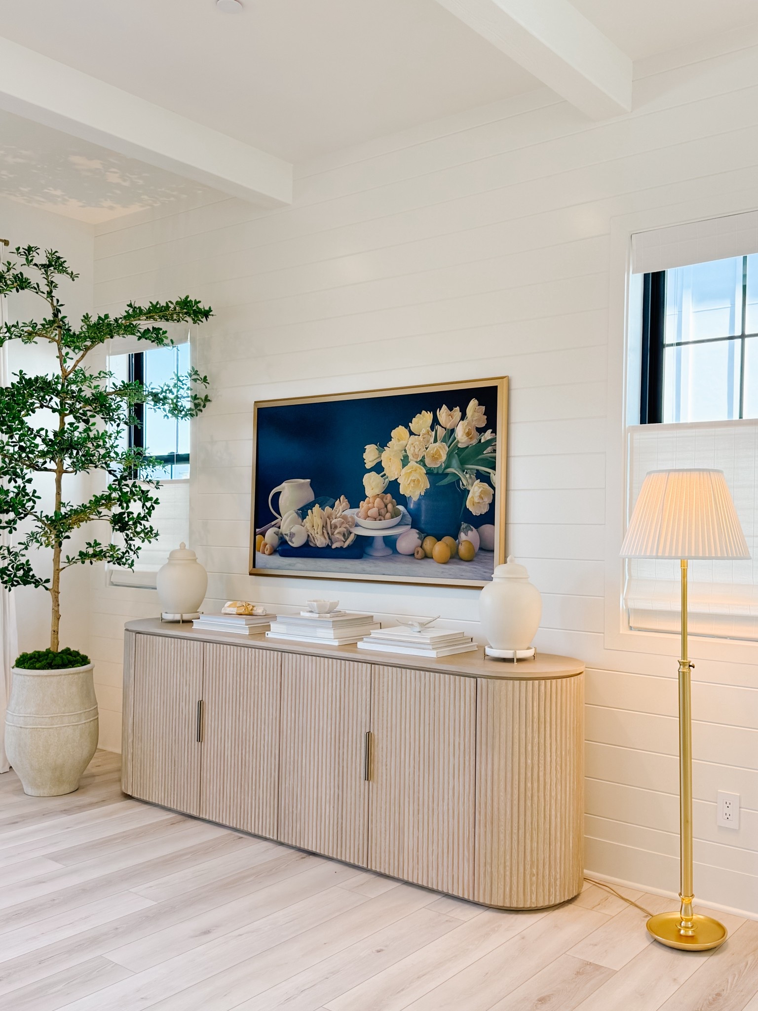 New candlestick floor lamp! The brass tone on this lamp is beautiful and I love that you can raise and lower the top section to whichever height you like. The pleated shade is gorgeous and it’s giving coastal grandmother/Nancy Myers vibes.💫

Also linking our 65” Frame TV. I love that you can subscribe to artwork in galleries all over the world through Samsung so when your TV is turned off, you can be sharing beautiful art rather than a black screen. We also added a gold frame which looks beautiful .

My faux tree is 8’ tall and it looks so real! 

#LTKHome