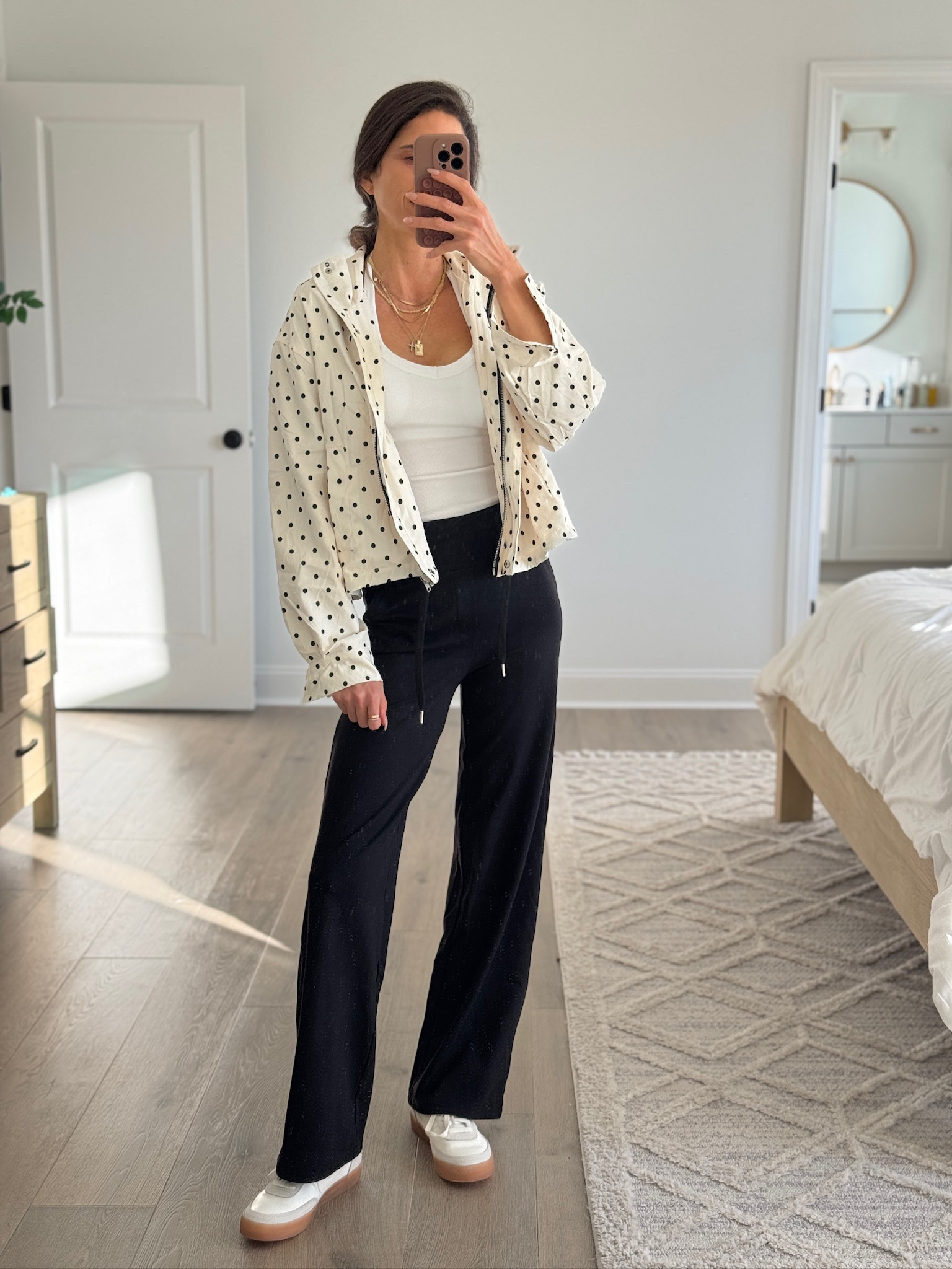 Easy layered outfit that works for everyday wear. Lightweight polka dot jacket styled over a fitted tank, paired with soft wide-leg pants and comfortable sneakers. Relaxed but still polished — perfect for errands, travel days, casual workwear, or school drop-off. A great mix of classic neutrals that you can wear year-round.

Casual outfit, everyday outfit, layered look, polka dot jacket, lightweight jacket outfit, wide leg pants, comfortable sneakers, neutral outfit, casual chic style, mom outfit, travel outfit, affordable fashion

#LTKActive #LTKSeasonal #LTKFindsUnder50