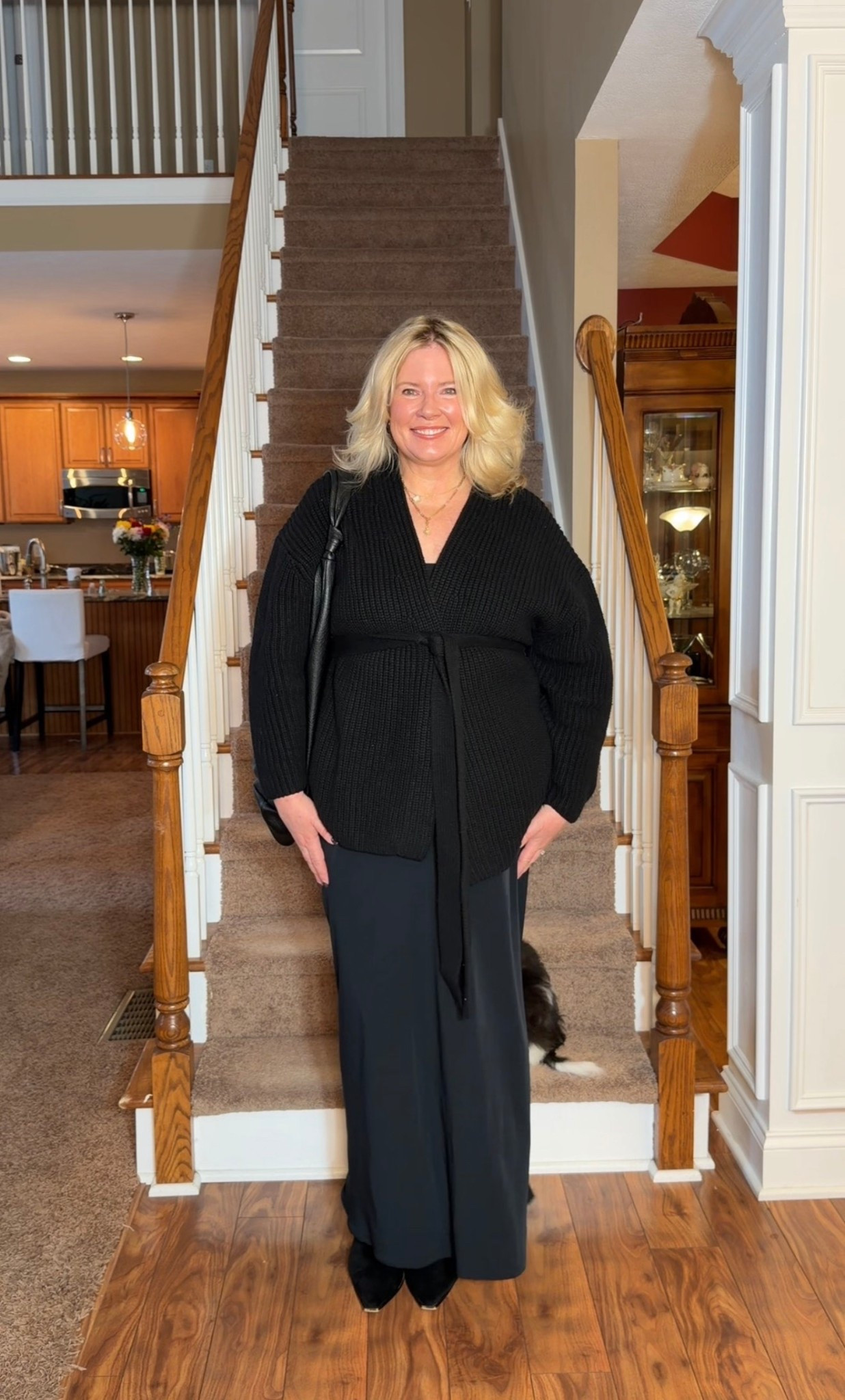 Love the new trending wrap style shirts! So flattering on any shape body!  And it’s currently on sale. Also don’t miss my slouch black tote bag. It’s the viral one from Anthropologie!  

#LTKOver40 #LTKgrwm #LTKootd