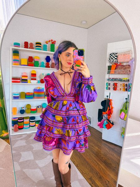 Fall transitional outfit 🍂🌸

Champagne wears a multicolored purple pink floral midi dress with poof sleeves and ruffles lace bows, brown knee high boots, gold snake earrings.

Dopamine dressing colorful vibrant eclectic maximalist maximalism rainbow multicolored colored hair style fashion inspo color fall

#LTKstyletip #LTKSeasonal #LTKHoliday
