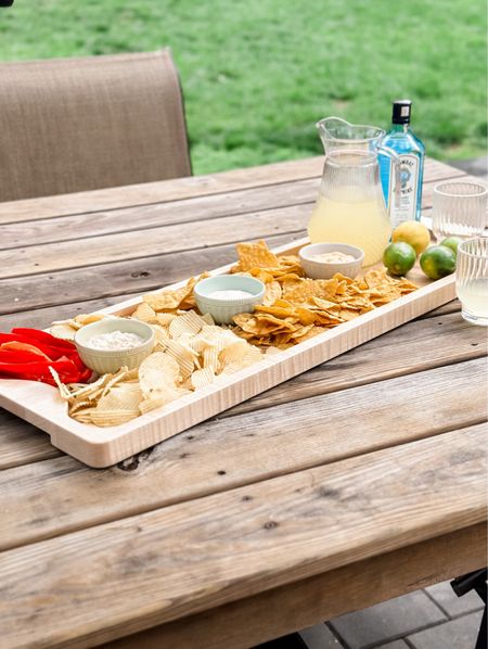 A great gift for the entertainer!!! We were gifted a large round one for Xmas once by my Mother In Law and it’s our go to board for charcuterie etc. This long was is easy to carry like a tray with the built in handles, so it’s perfect for outside platters etc! 

#LTKSummerSales #LTKHome #LTKFindsUnder100