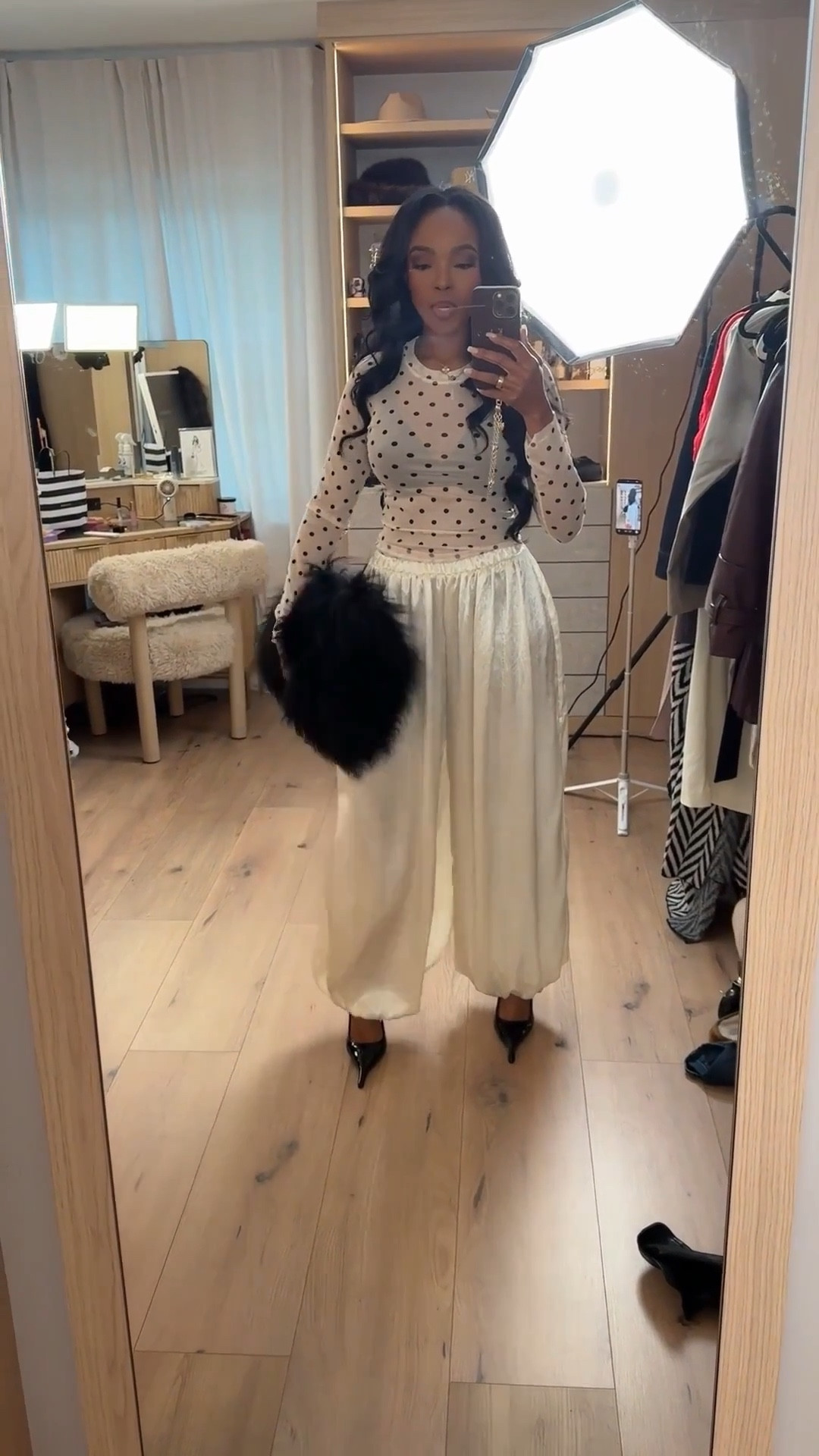 Scroll to shop this feminine chic look 🤍

This polka dot top paired with a flowy skirt gives that timeless, soft elegance with a modern edge—especially styled with black accessories for contrast. It’s an easy outfit to rewear and mix with other staples, making it a smart pick where your cost per wear keeps going down.

Perfect for brunch, date days, events, and elevated daytime looks.

📏 Measurements: 5’4”, 140 lbs, 34D bust, 27” waist, 40” hips

Follow me on Instagram and YouTube @kirasfashionfinds