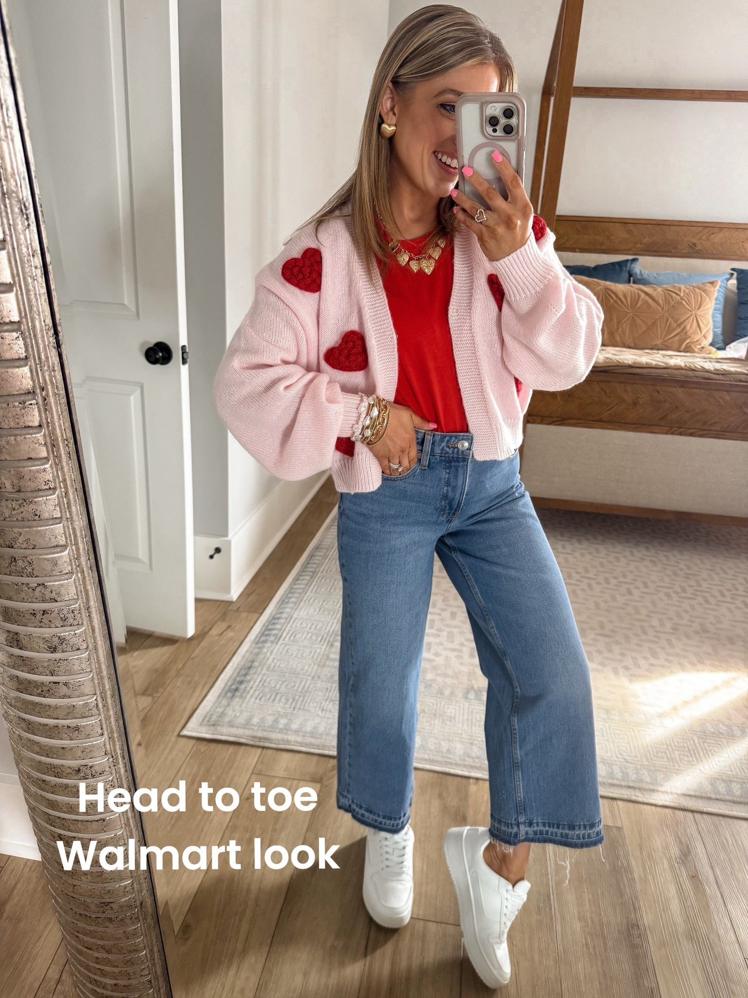 Head-to-toe Walmart and every single piece is SO good ❤️ This new $19 heart cardigan is hands-down one of my favorite finds right now — the soft blush pink knit with bold red heart details is perfect for Valentine’s outfits, but honestly cute enough to wear all season long. I styled it with a classic red tee, wide-leg denim, and comfy white sneakers for an easy everyday outfit that works for school drop-off, weekend errands, or casual lunch dates.

If you love affordable Walmart fashion finds, cozy cardigan outfits, and budget-friendly Anthro-style sweaters, this one is a must. It looks way more expensive than it is and layers perfectly over tees, tanks, and even dresses. Proof that the cutest heart-print cardigan doesn’t have to cost a fortune 💕

#walmartfashion #walmartfinds #walmartstyle #heartcardigan #valentinesoutfit #affordablefashion #budgetstyle #everydayoutfit #casualoutfitideas #momstyle #lookforless #walmartnewarrivals #pinkandred #springlayering