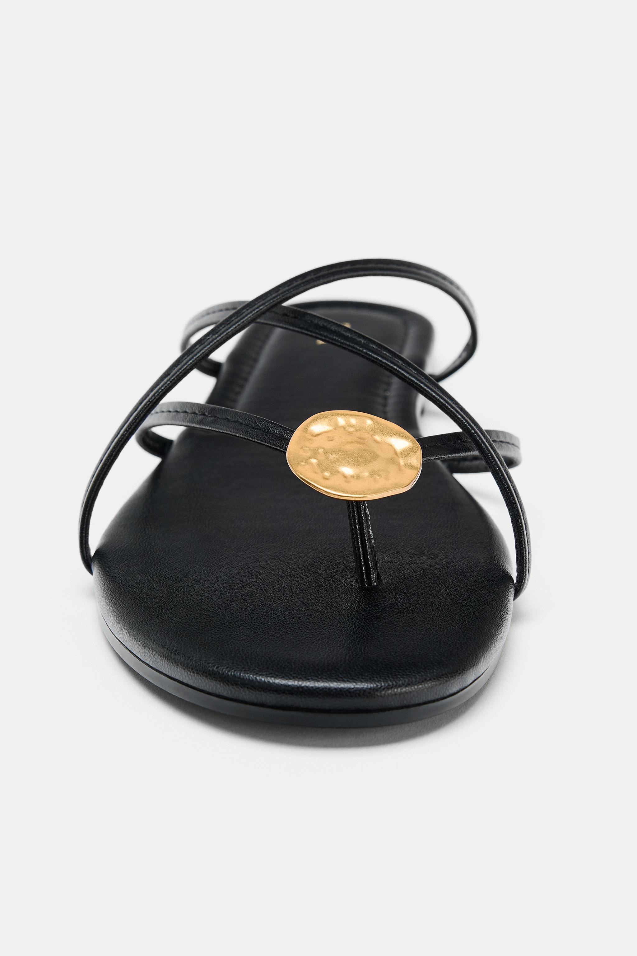 Flat sandals. Multi-strap design with topstitching detail on the front. Metal appliqu\u00e9 detai... | Zara UK