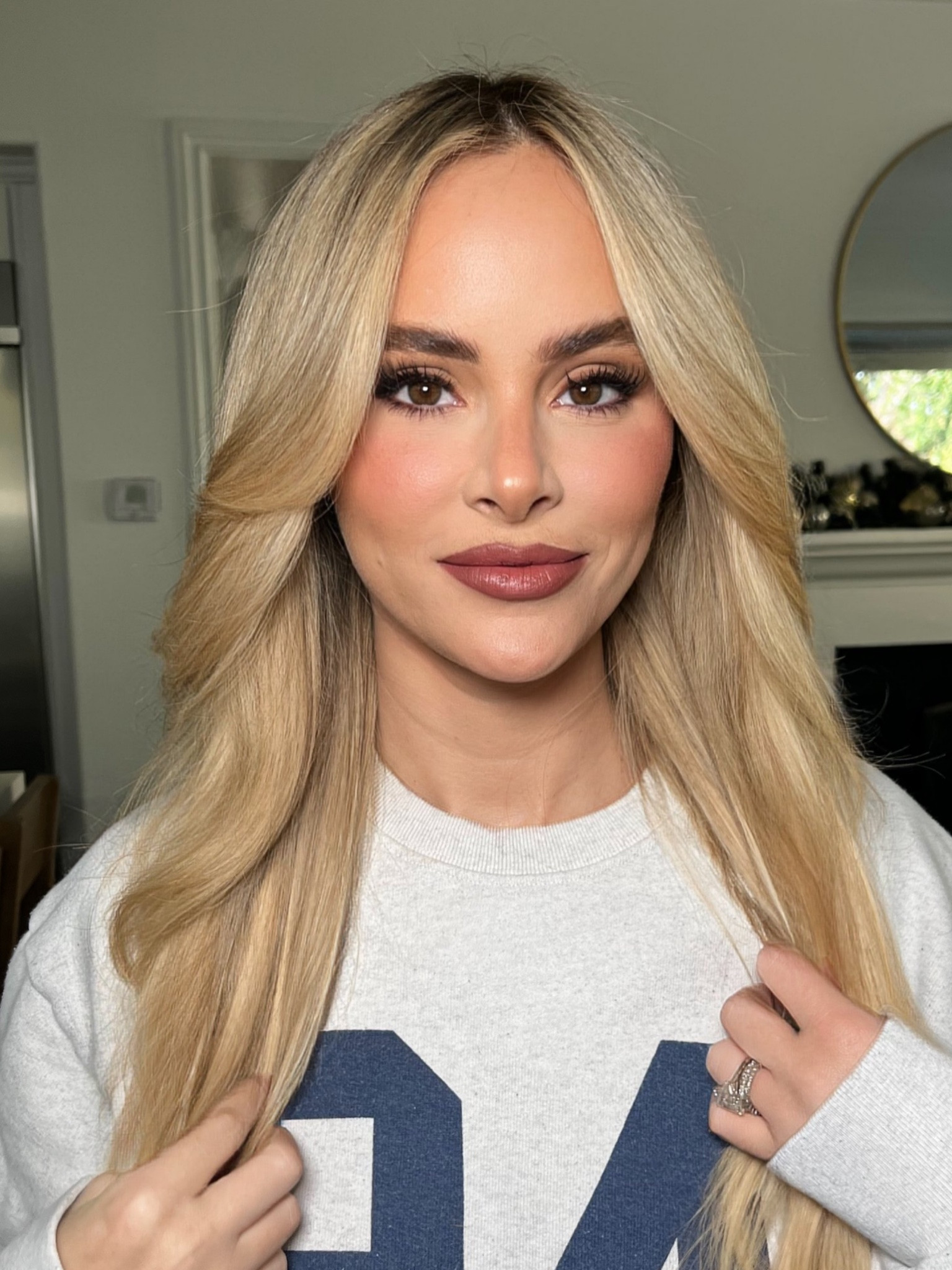 Christmas photo makeup 
pro tip: the lipstick was shiny and I wanted a matte lip for this look so I mattified the lip with a little translucent powder. #LTKBlackFriday 

#LTKBeauty