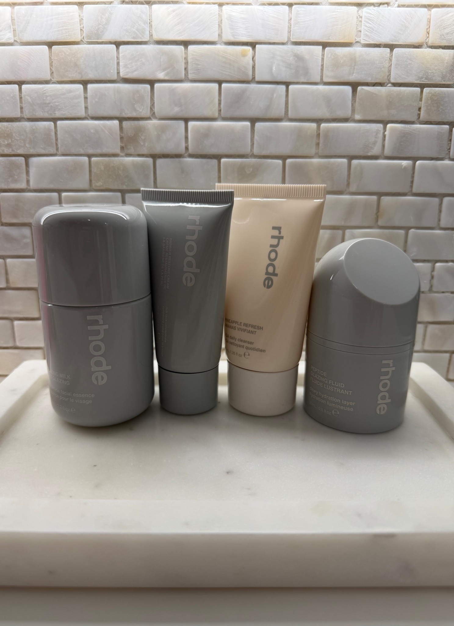 Finally hopping on the Rhode bandwagon & honestly… I don’t know why it took me this long. 🤍

I grabbed the travel set, which I think is the perfect way to try products before fully committing to the full sizes. It also couldn’t have come at a better time because I’m heading on a trip & needed a full skincare lineup that’s easy to pack.

You get all the essentials, so it’s great for testing the routine or just having a simple, travel-friendly skincare setup. I’m especially excited to try the Barrier Restore Cream because everyone swears by it for hydration & skin barrier support.

Linking everything I can here if you’ve been curious about Rhode like I have. ✨

#LTKTravel #LTKBeauty #LTKselfcare