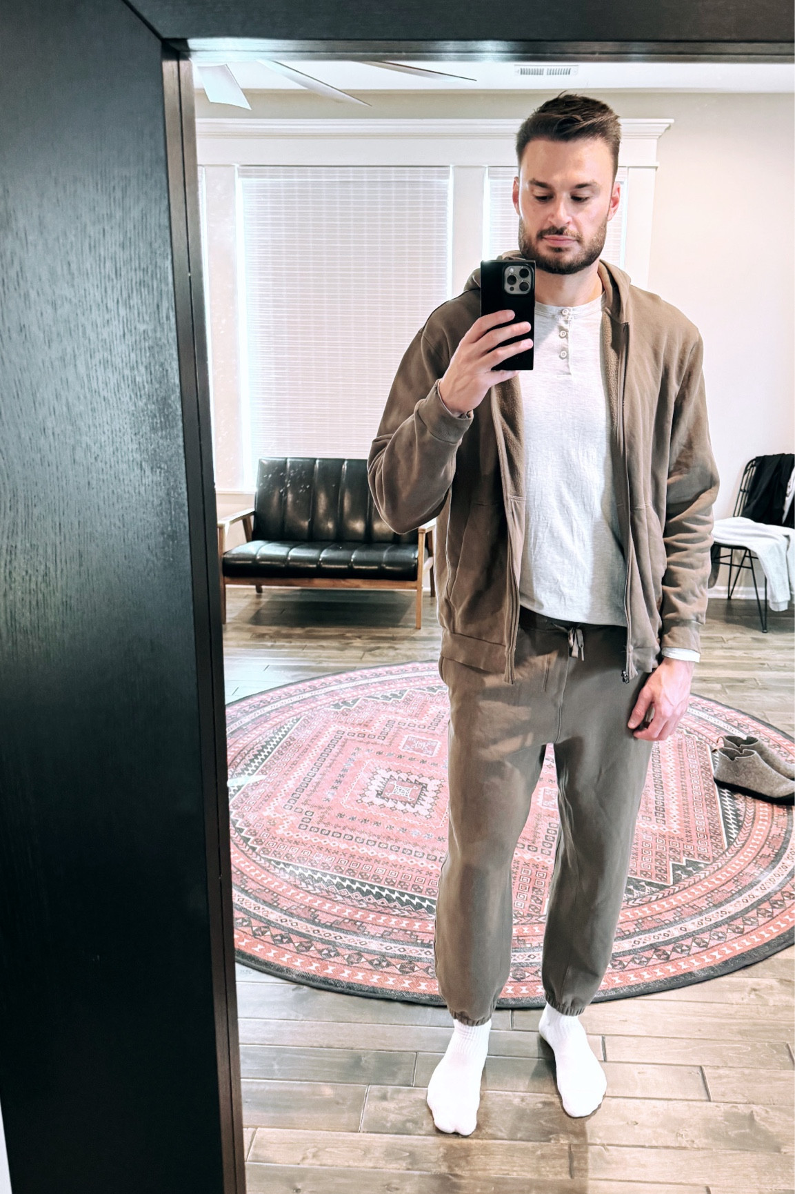 Work from home days = sweat set days! My favorite. This sweat set is a go-to of mine. The pants come in 3 different inseams which I so appreciate as a tall guy. I’m 6’4’’ and I like the 37’’ inseam (long size). The zip up hoodie I always want to fit bigger, so I get an XL so I have plenty of room. I have this set in Nomad and Grey. You can get the top in a regular hoodie or a zip-up hoodie, or both! Let me know if you have questions about this set. 

#LTKfitness #LTKSeasonal #LTKmens