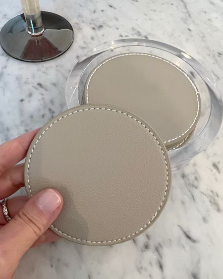 Neutral round leather coasters in a clear acrylic coaster holder (which is really a wine coaster but it was perfect to hold these) I linked similar coasters in other colors that are sold with this exact acrylic holder from Caspari.

#LTKhome #LTKstyletip #LTKfindsunder50